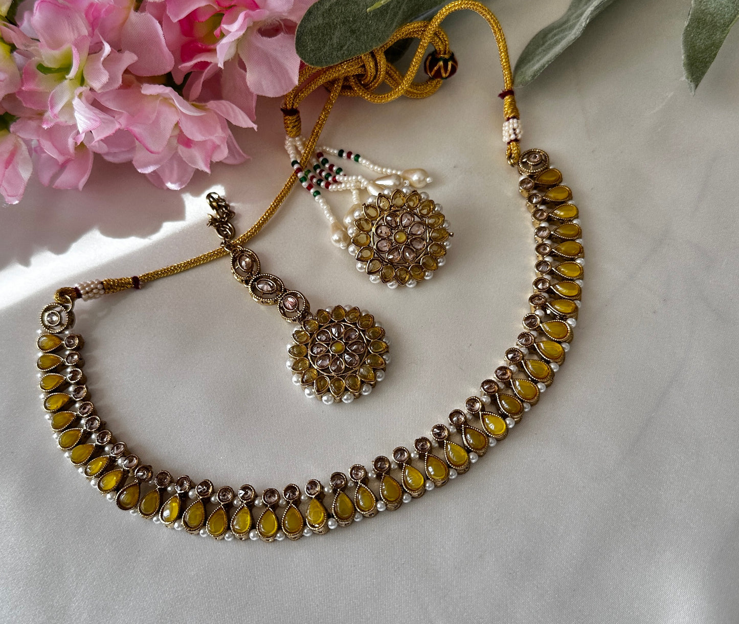Polki necklace with studs and tikka