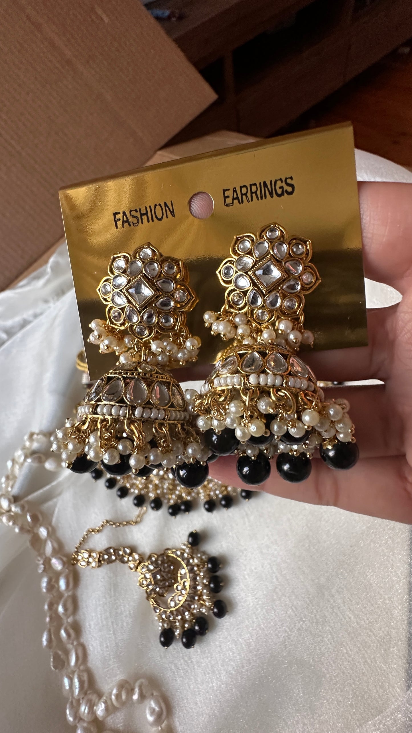 Kundan choker or necklace set with earrings and tikka black