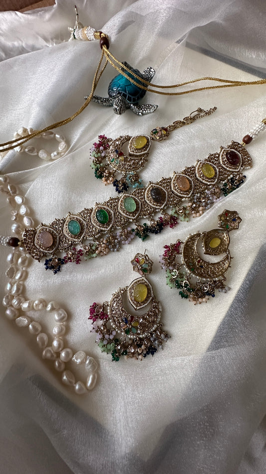 reverse ad Kundan choker set with earrings and tikka multi