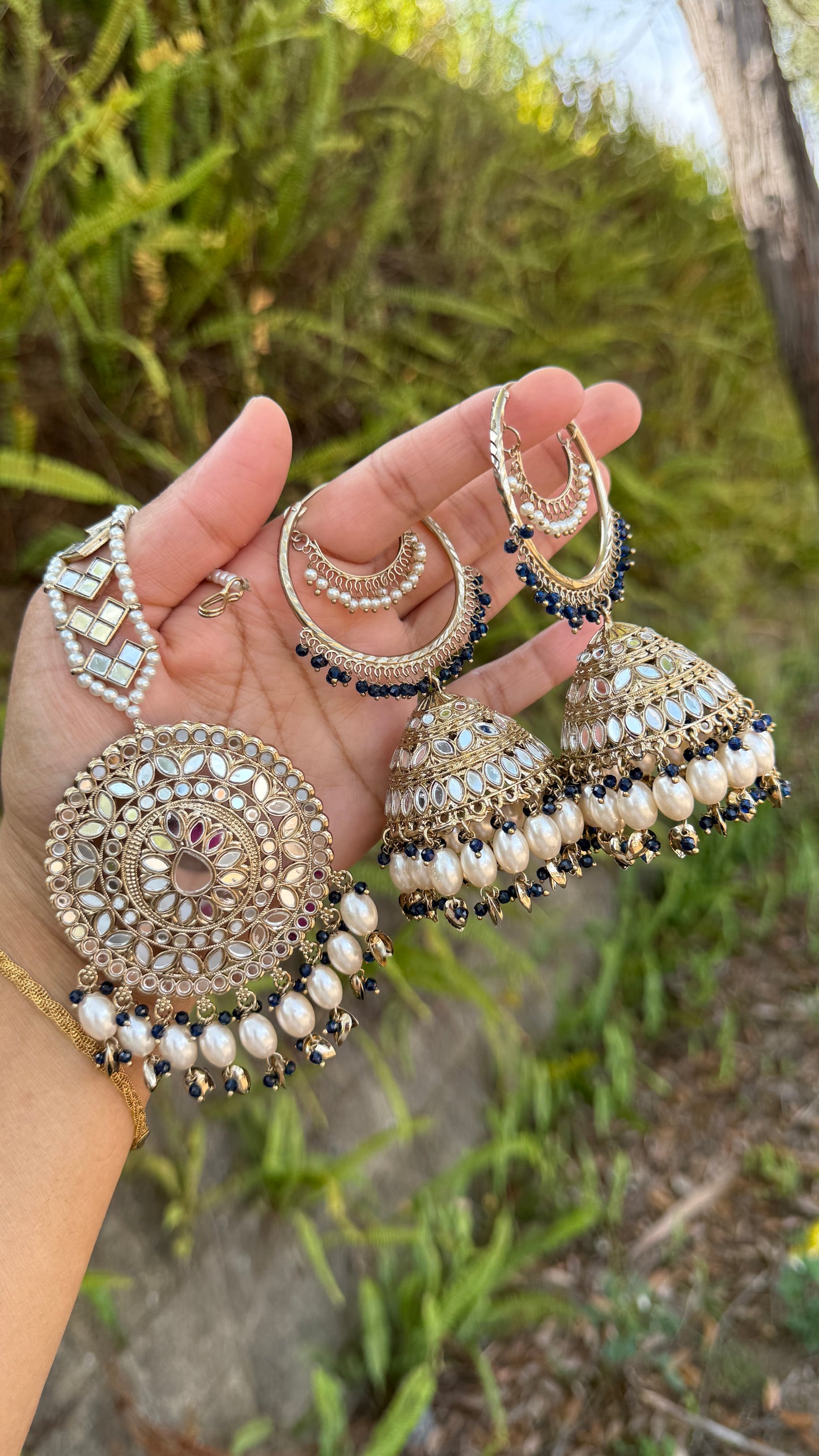 jhumka earrings with matching tikka, adorned with mirrors and intricate detailing, ideal for bridal and cultural events or casual party wear