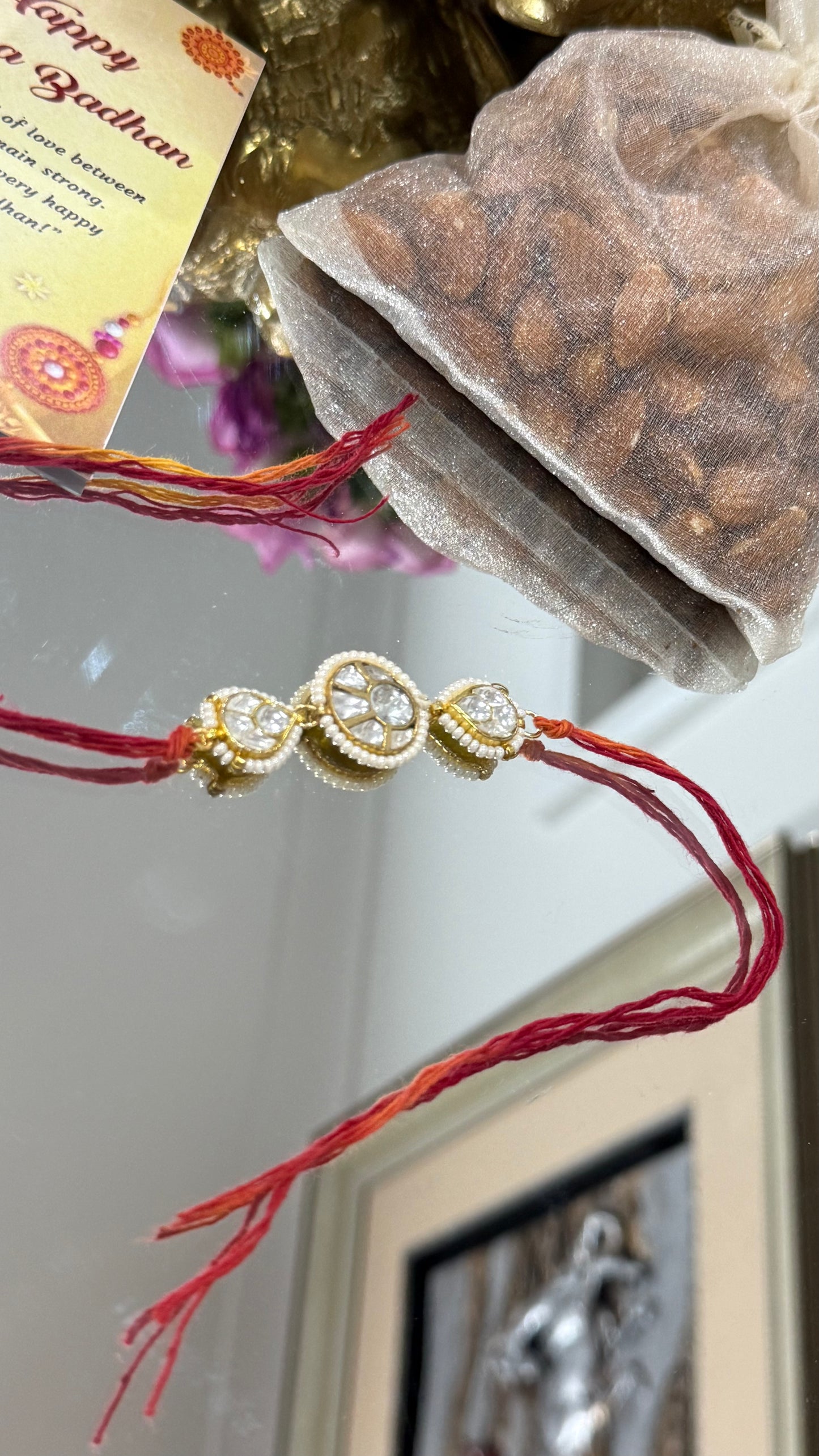 Elegant Pachi Kundan Rakhi with traditional Indian design, available in Australia and worldwide for Raksha Bandhan gifting
