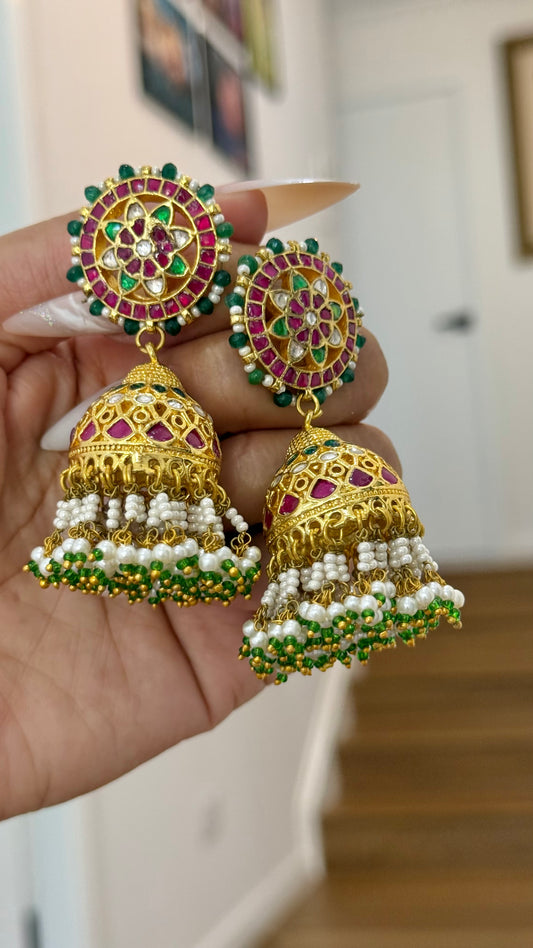 Gold-plated Pachi Kundan Jhumka with red and green stones, perfect for bridal and festive occasions