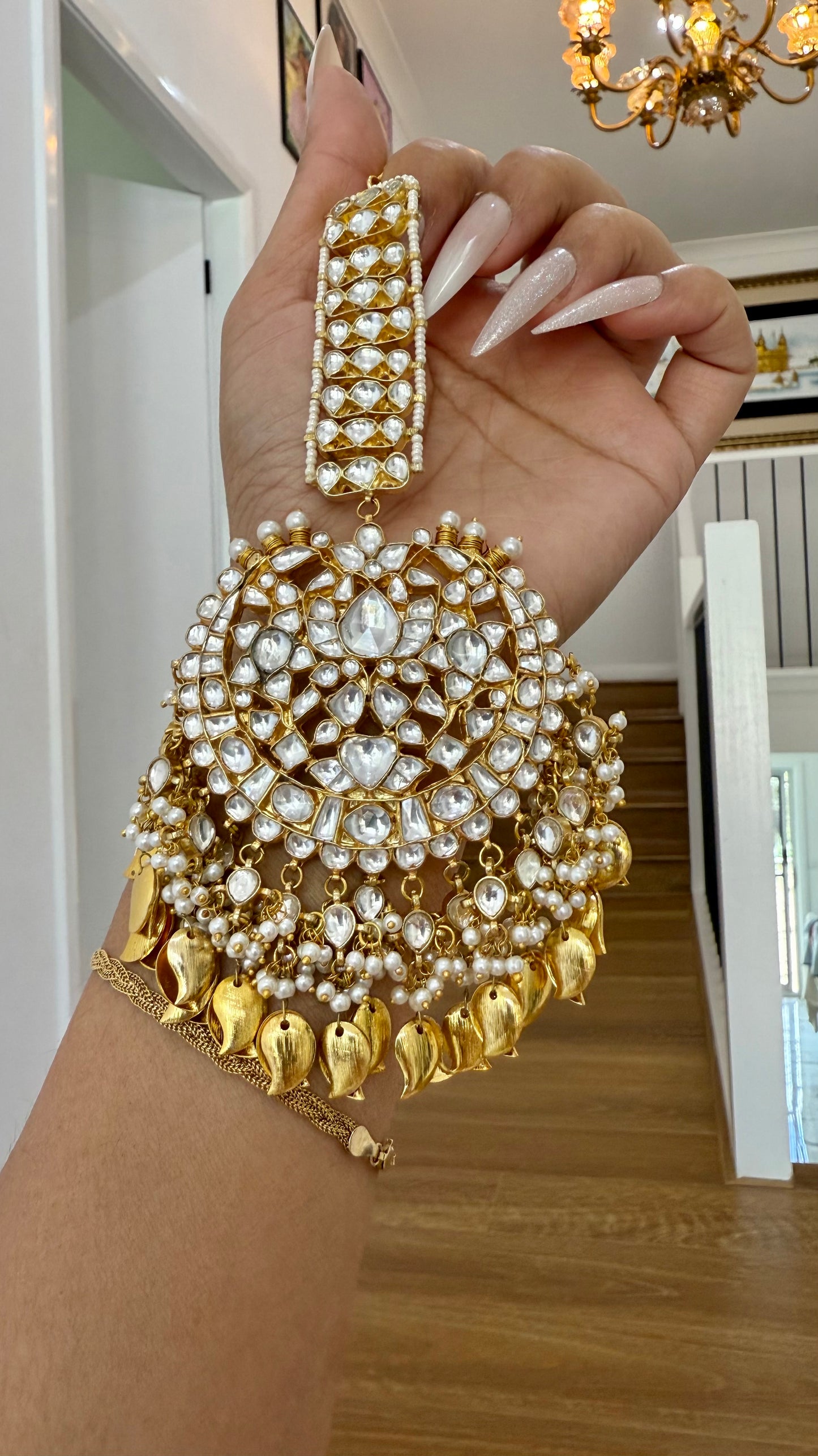 Gold-plated Pachi Kundan tikka for brides and special occasions