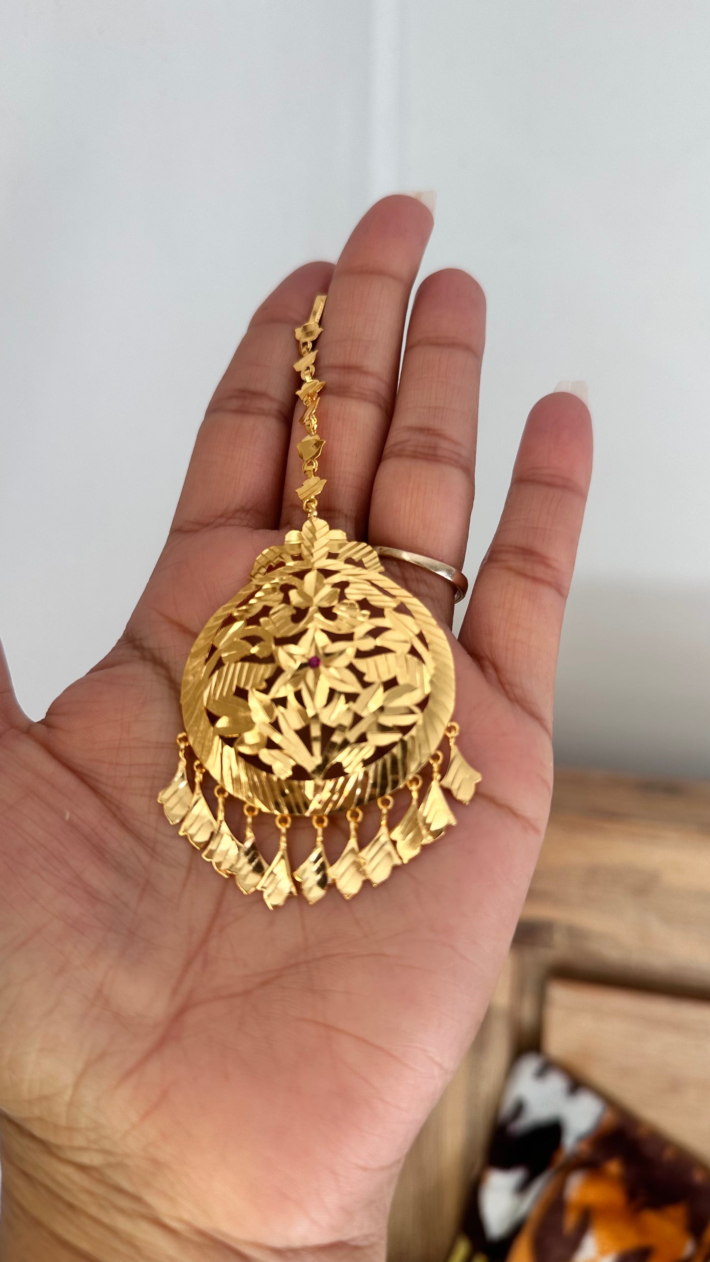 Gold plated tikka sandookh