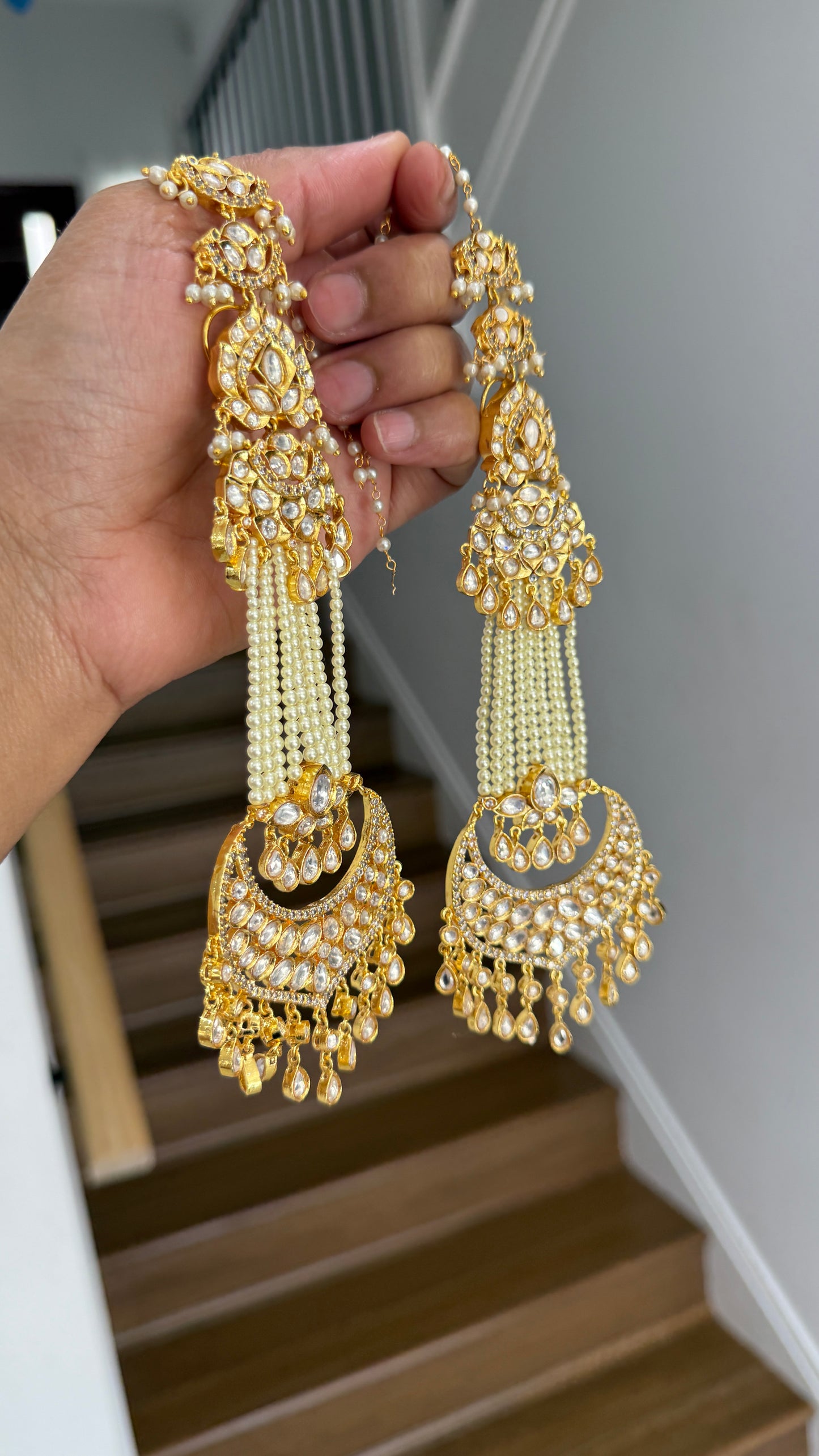 Gold-plated long earrings with intricate Kundan beads, Bollywood-style design, perfect for weddings and festive occasions. Premium quality earrings