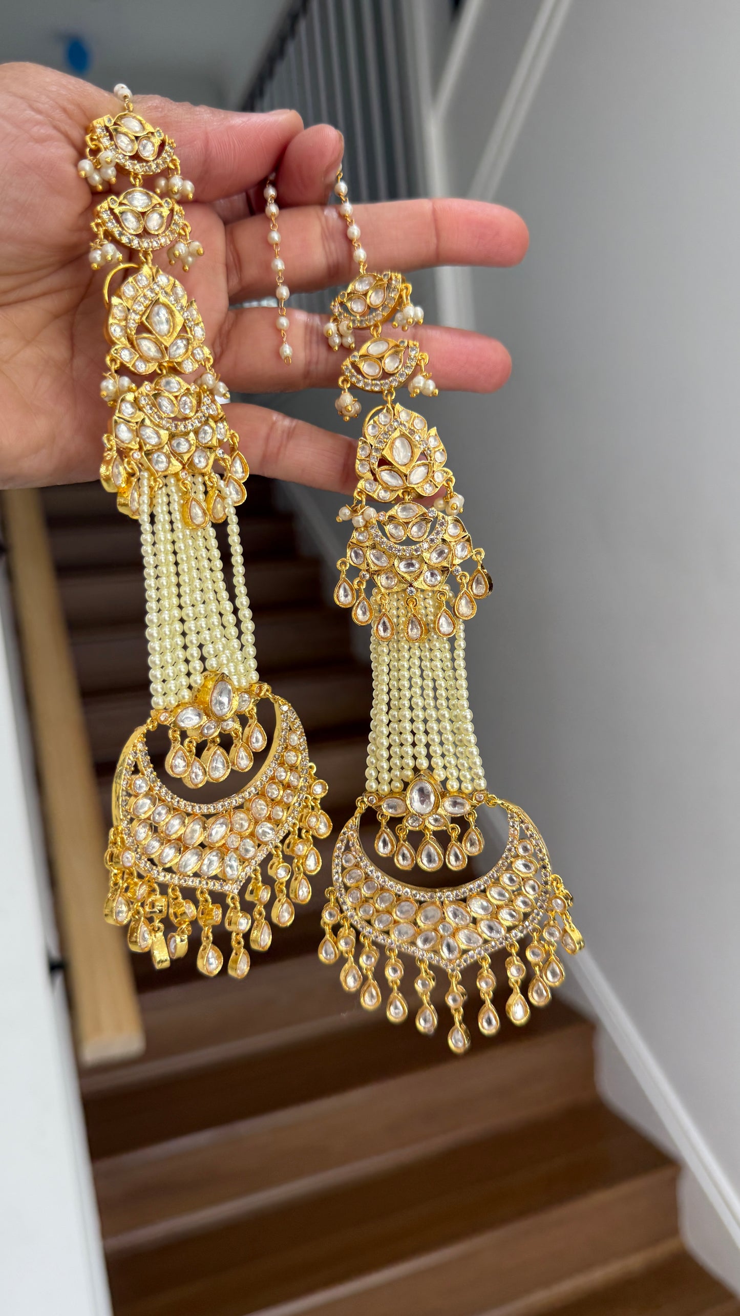 Gold-plated long earrings with intricate Kundan beads, Bollywood-style design, perfect for weddings and festive occasions. Premium quality earrings