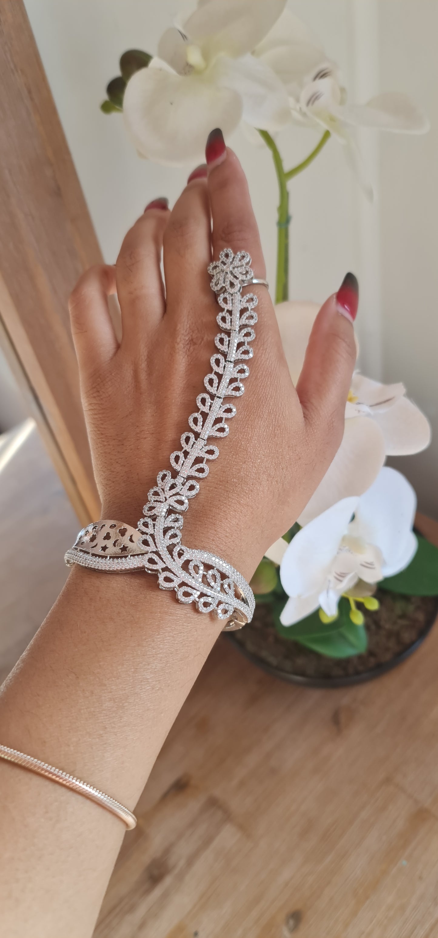 Bracelet attached with ring american diamond