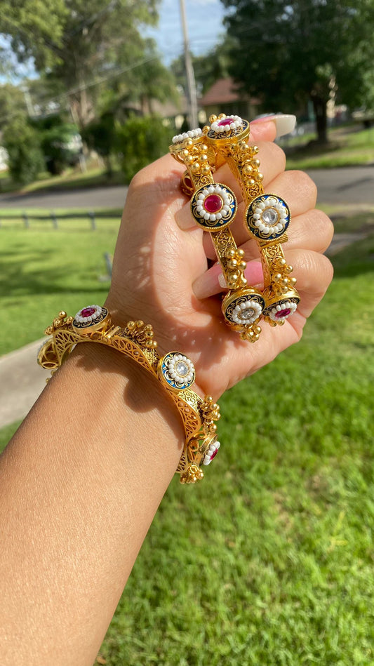 Gold-plated Pachi Kundan kangan bangle with red and green stones, perfect for bridal and festive occasions