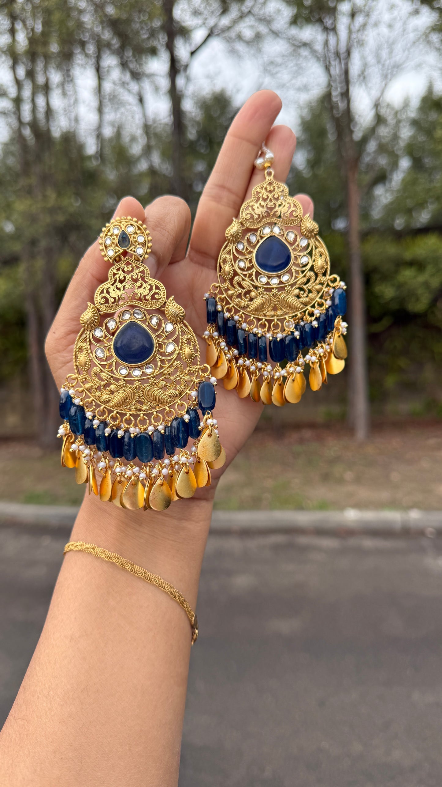 Kaira oversizes earrings with tikka Antique look