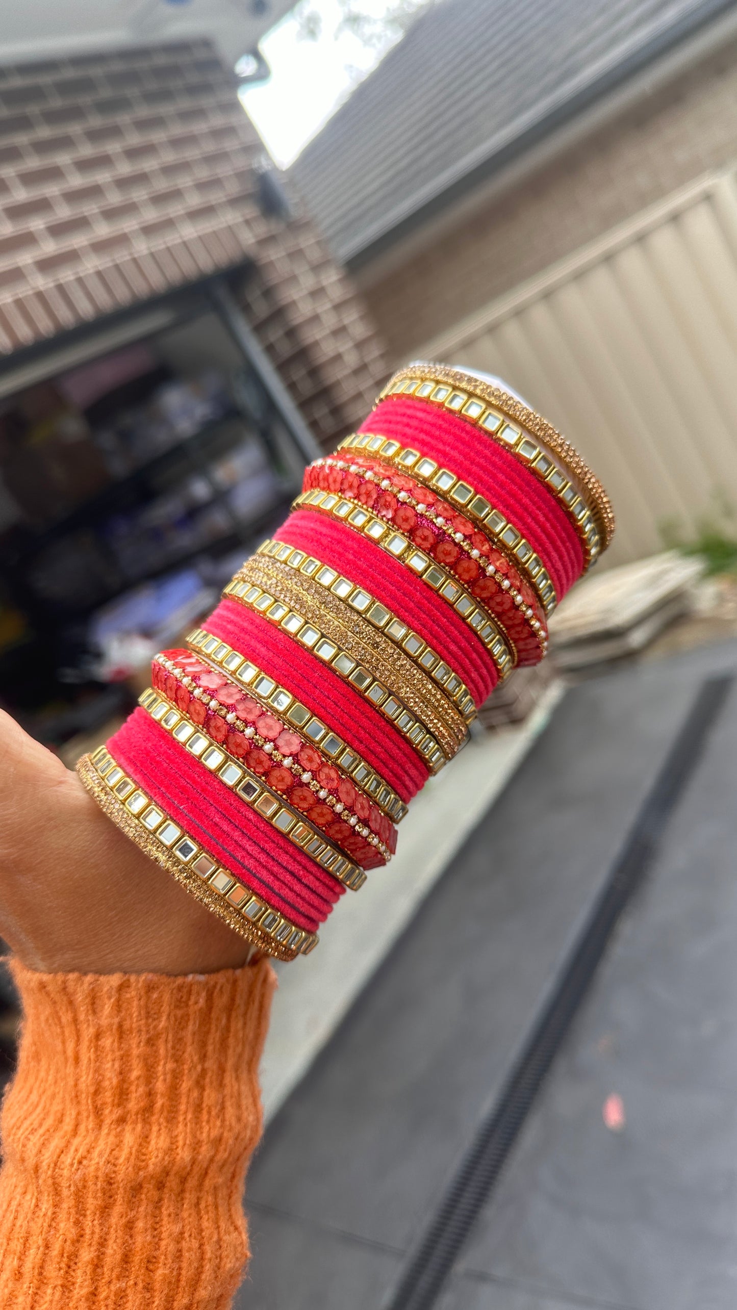 carrot pink metal bangles