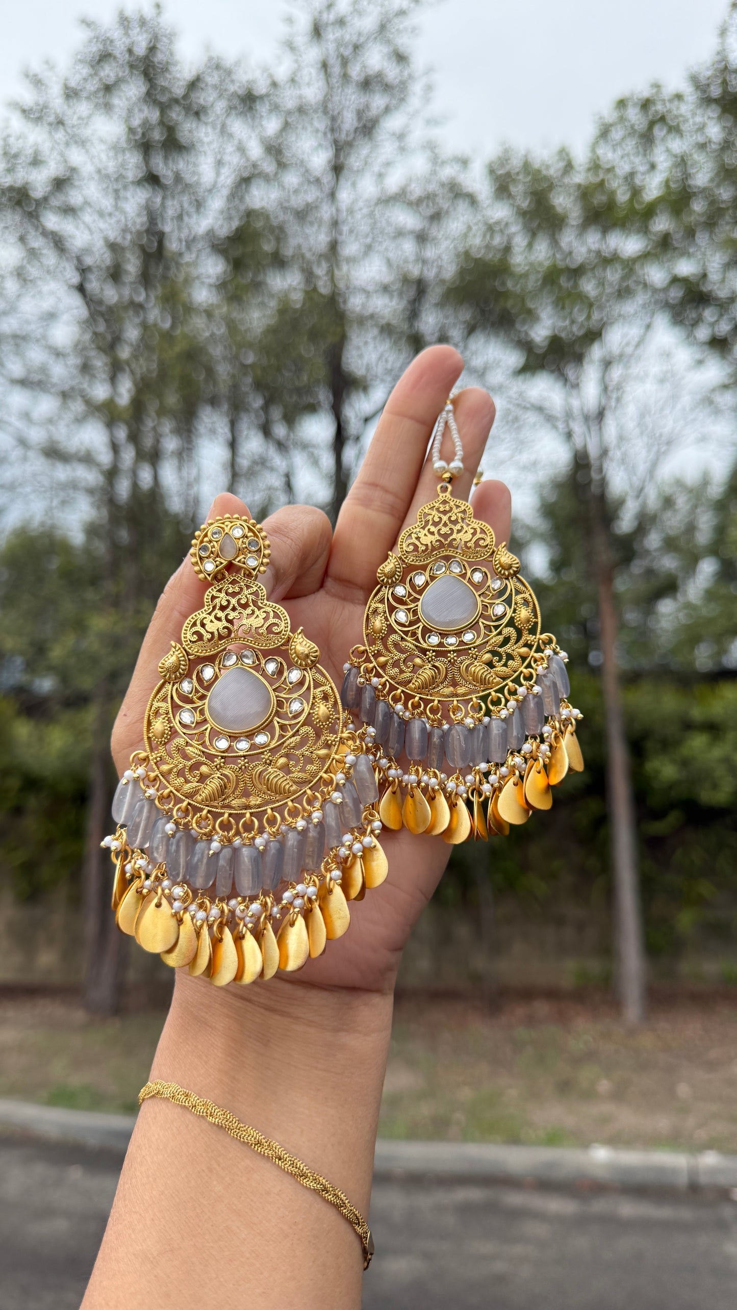 Kaira oversizes earrings with tikka Antique look