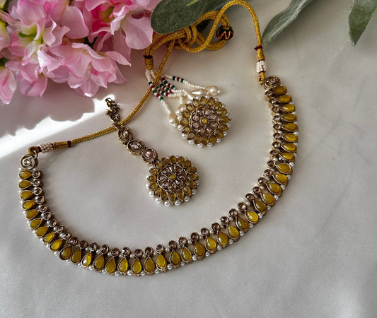 Polki necklace with studs and tikka