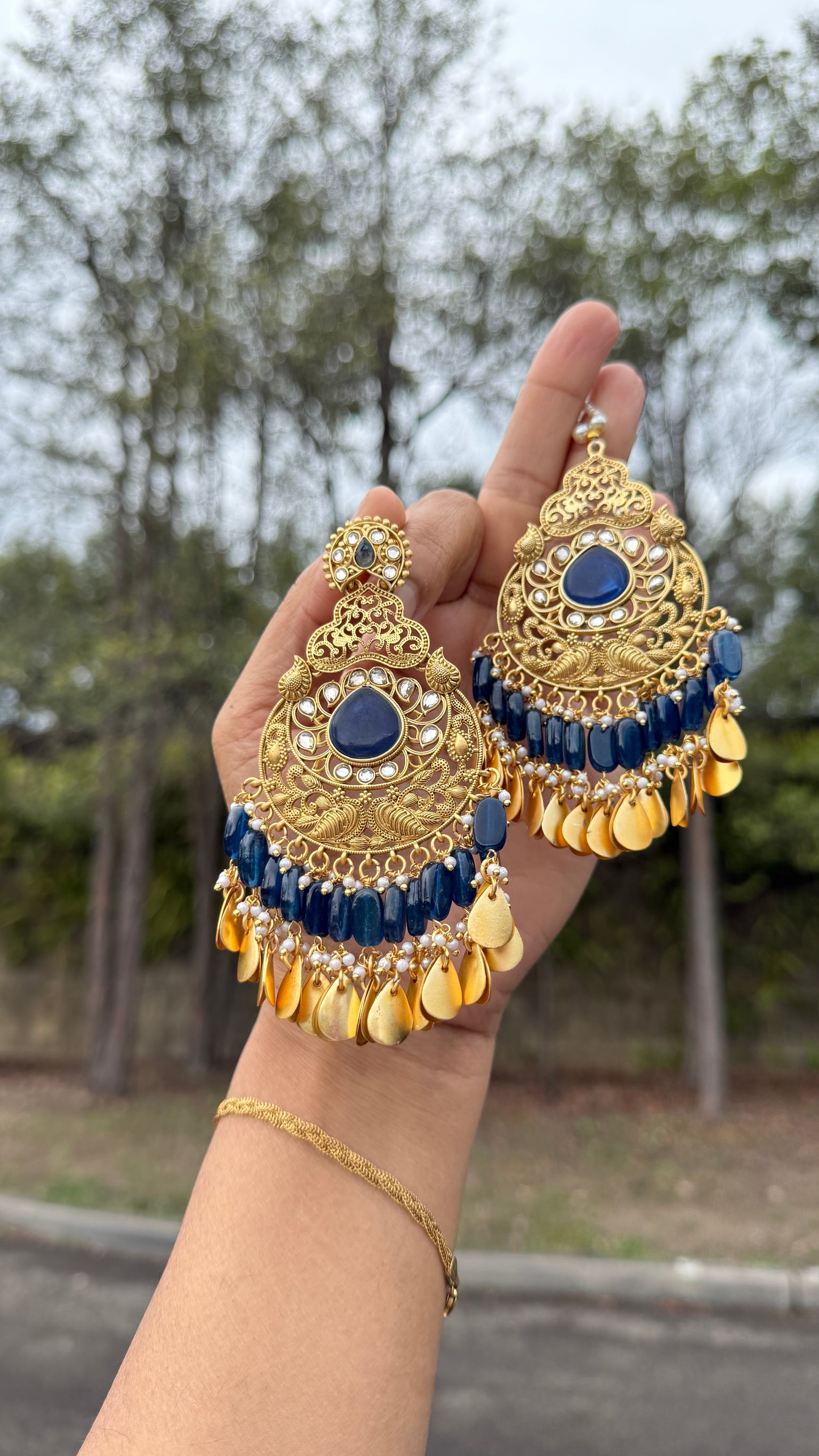 Kaira oversizes earrings with tikka Antique look