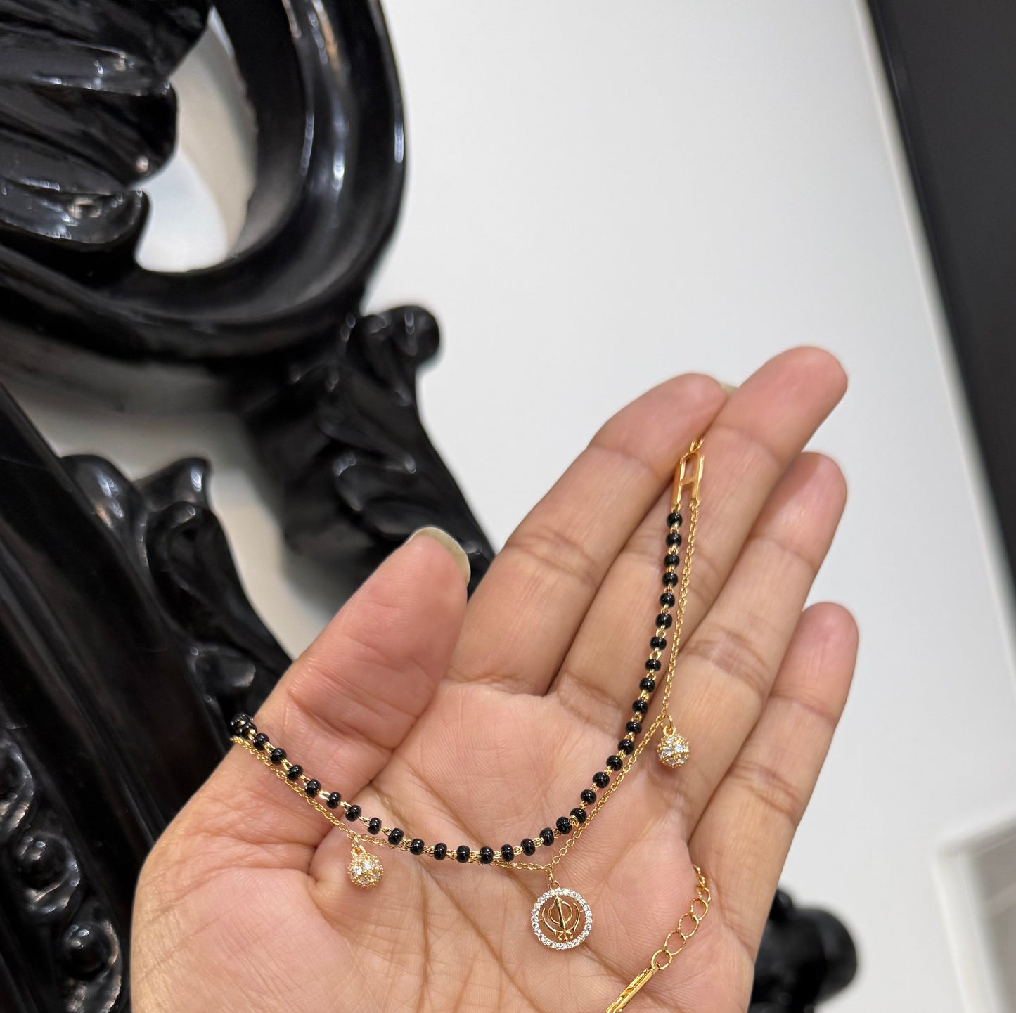 Khanda bracelet with black beads