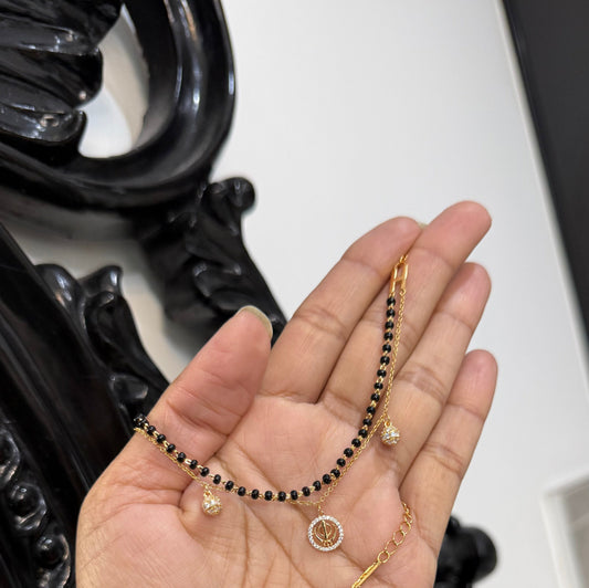 Khanda bracelet with black beads