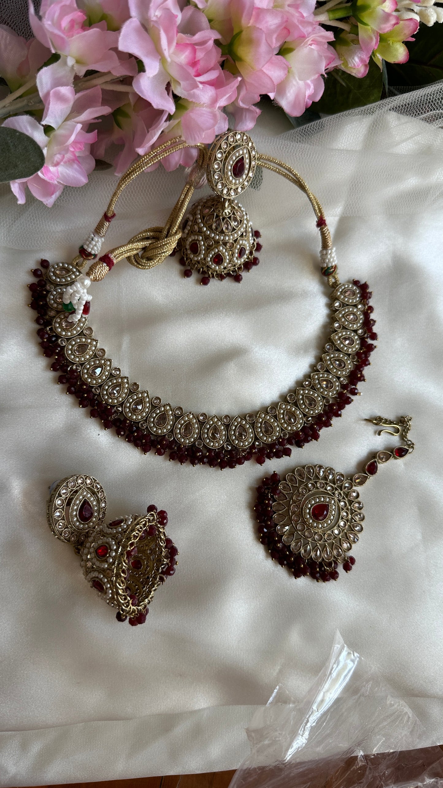 polki necklace with jhumka and tikka mehroon