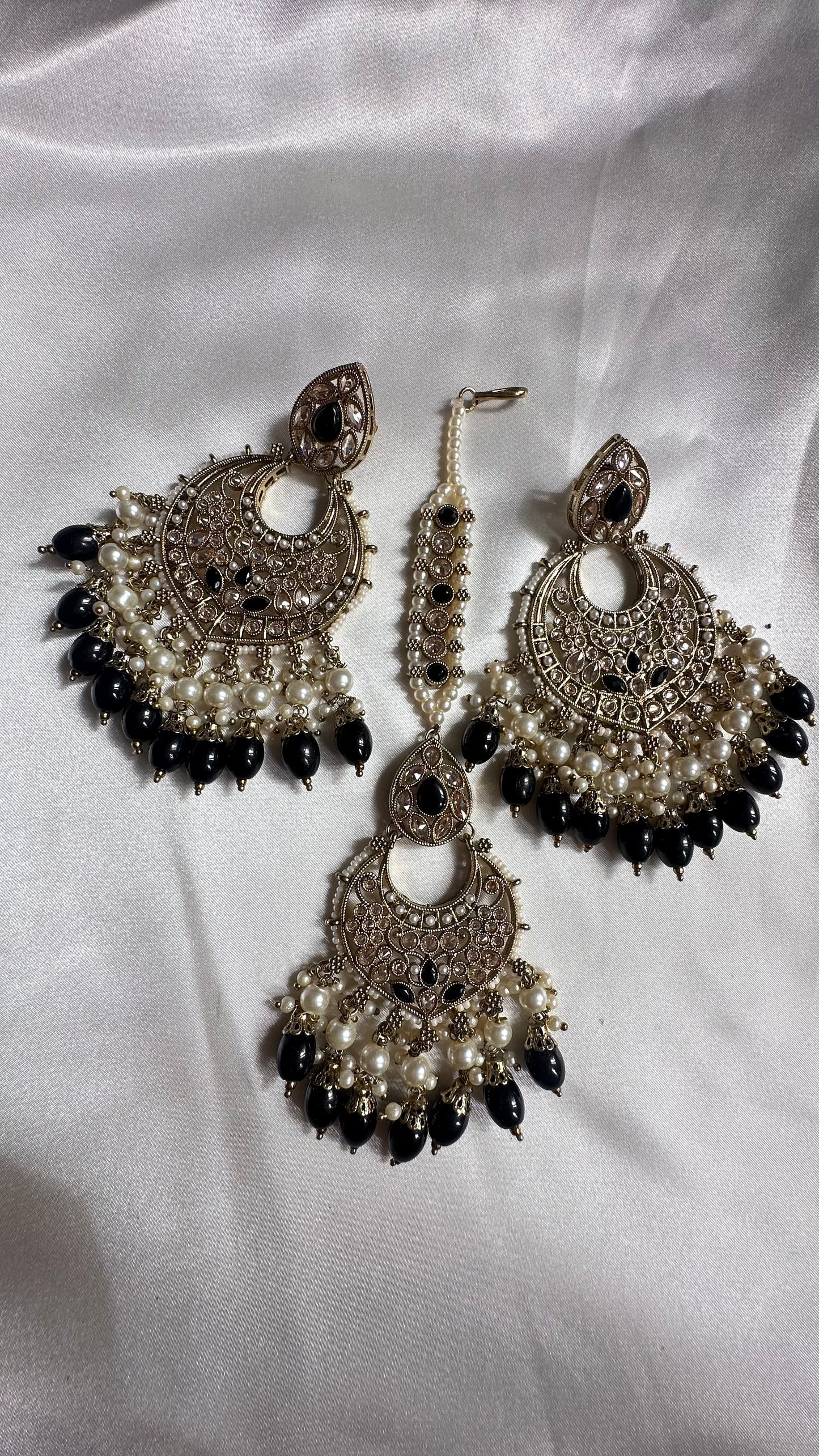 Reverse ad earrings and tikka