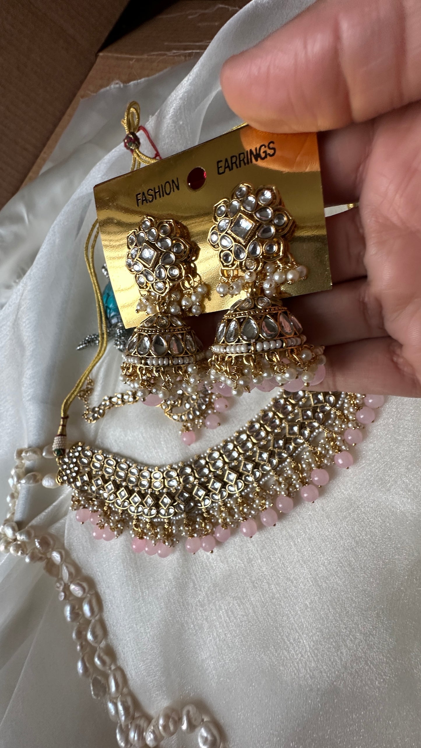 Kundan choker or necklace  set with earrings and tikka baby pink