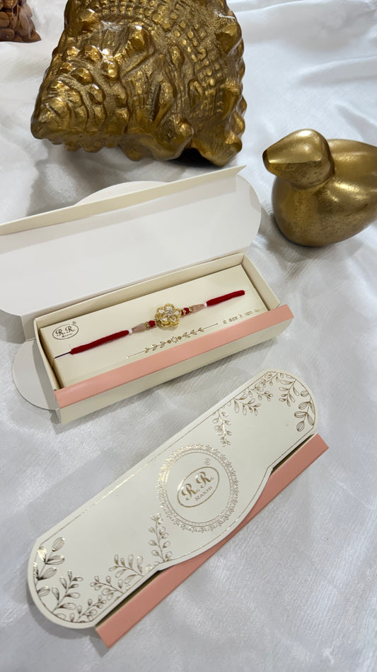 gold look Revolving Rakhi