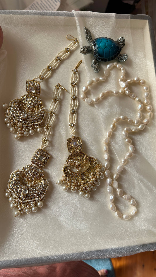 Kundan earrings and tikka with sahare golden