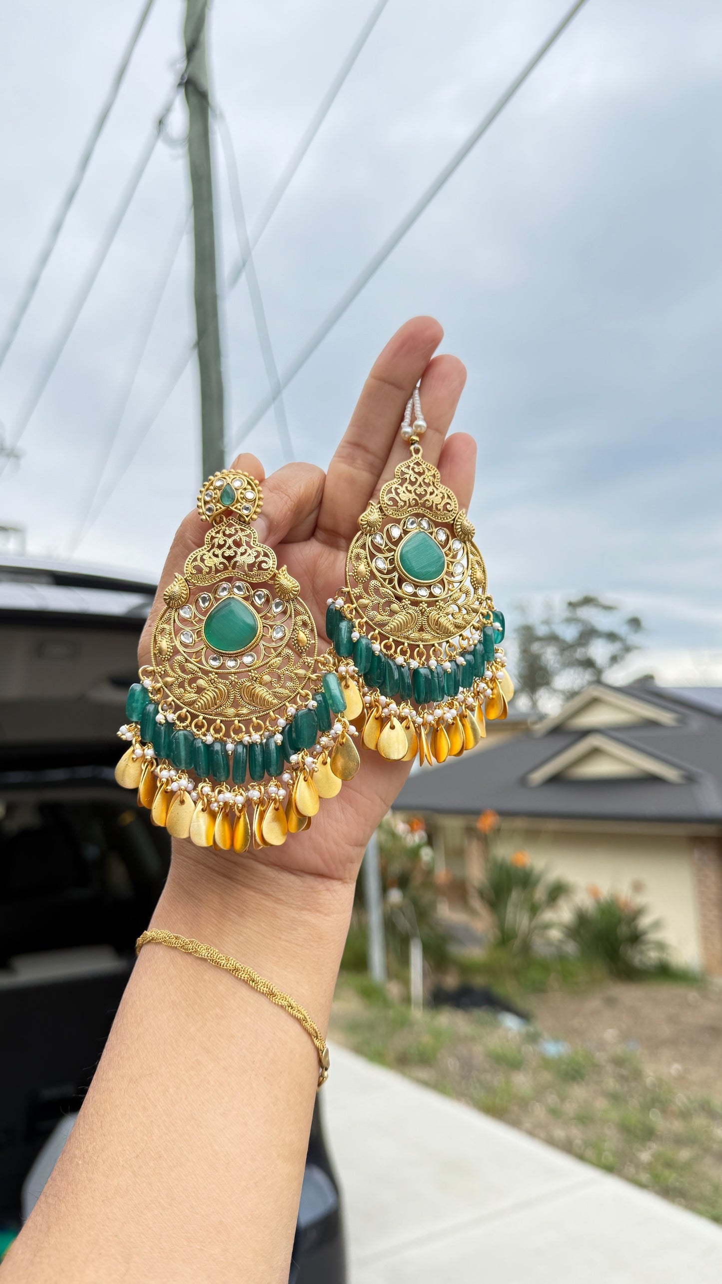 Kaira oversizes earrings with tikka Antique look