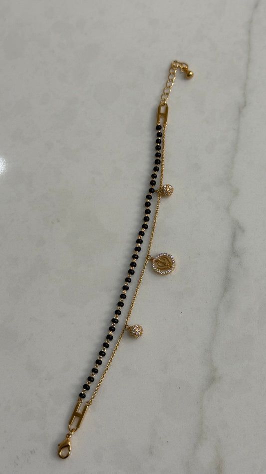 Khanda bracelet with black beads