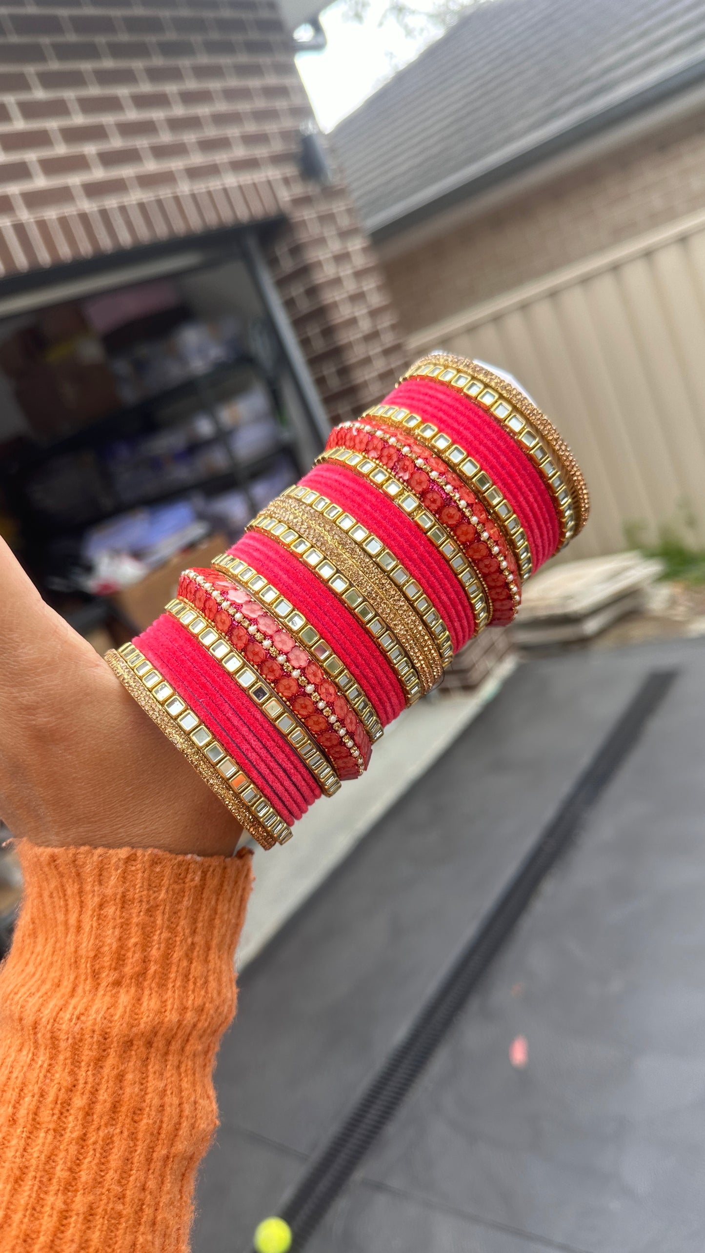 carrot pink metal bangles