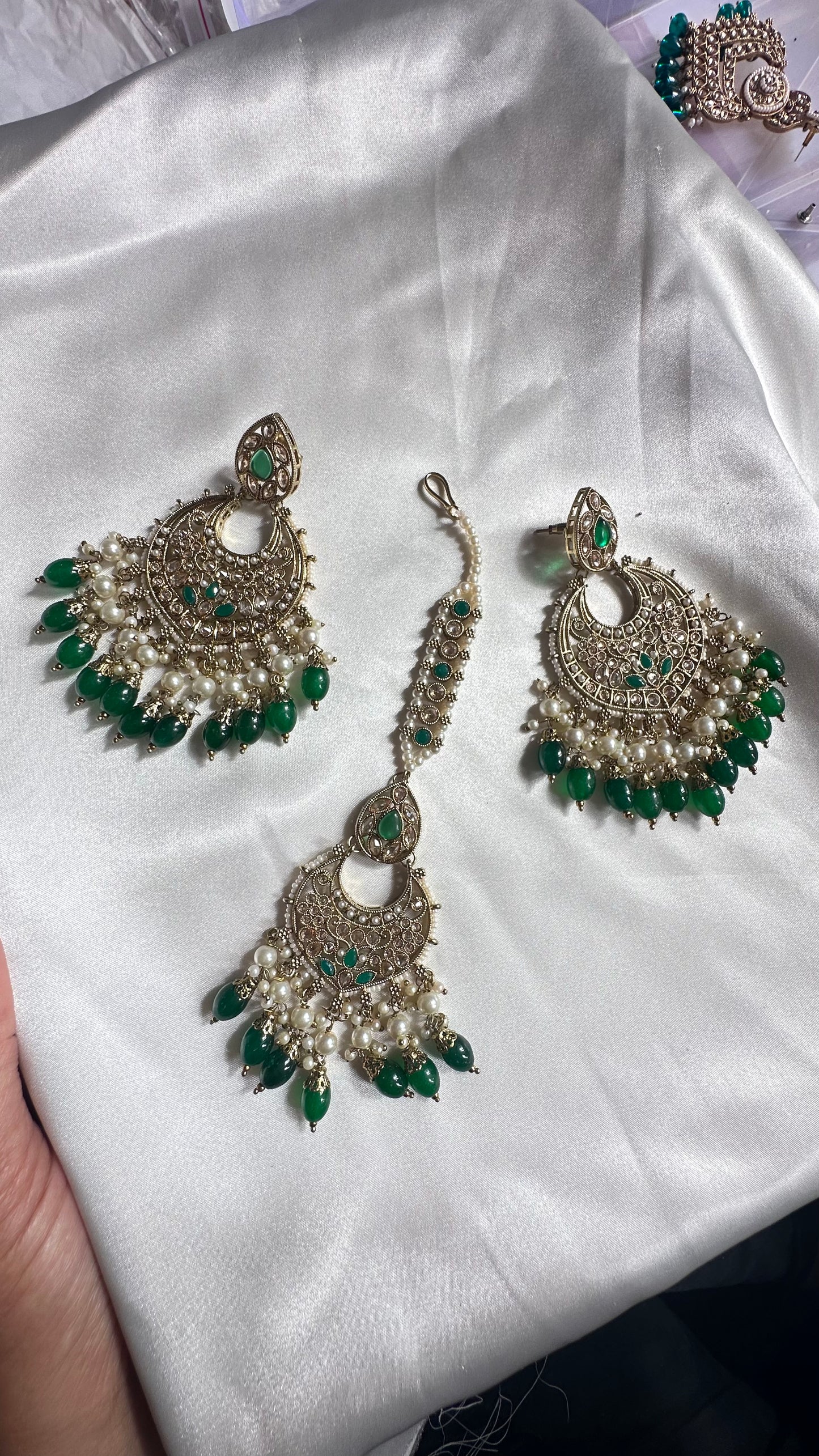 Reverse ad earrings and tikka