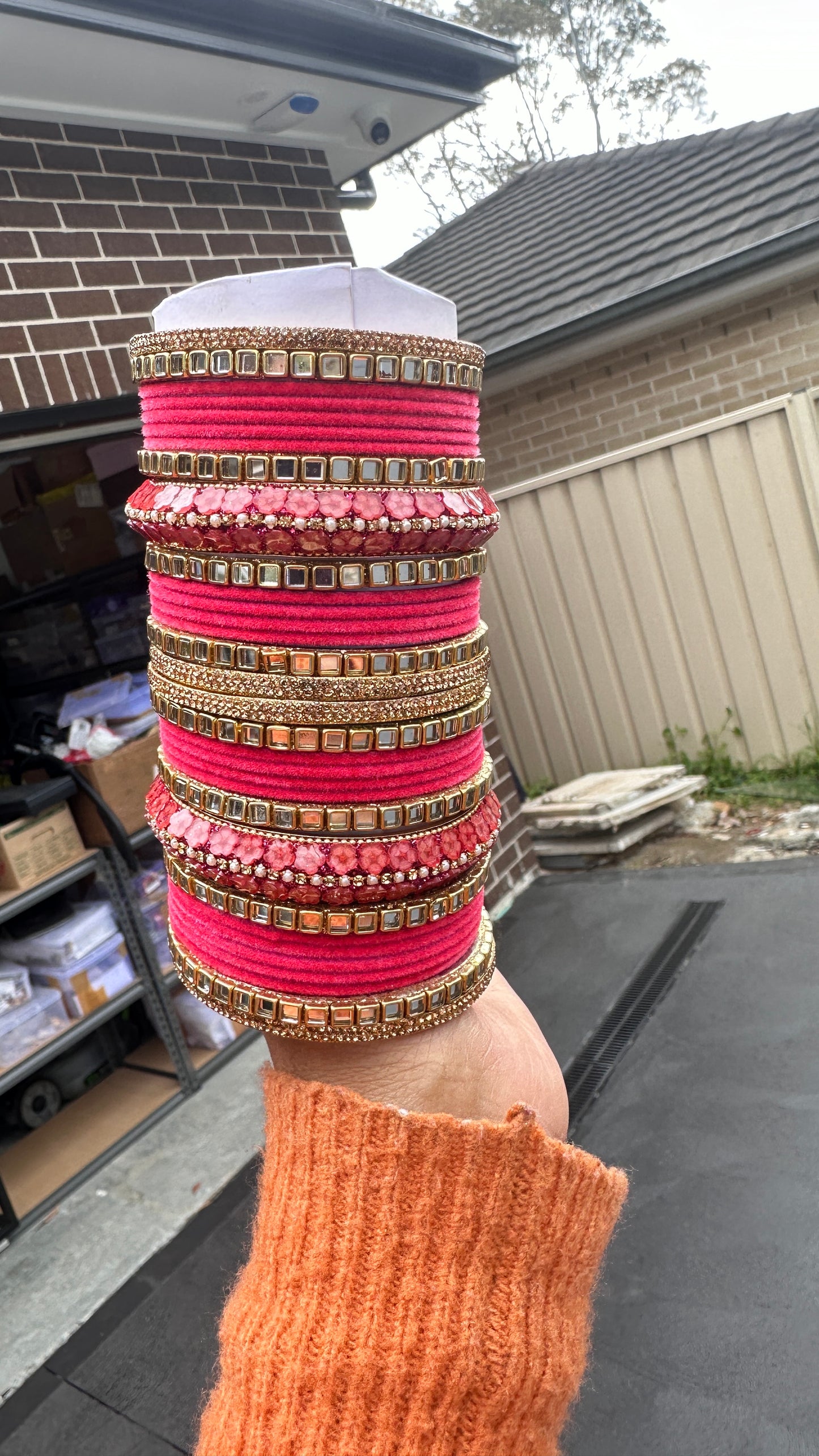 carrot pink metal bangles