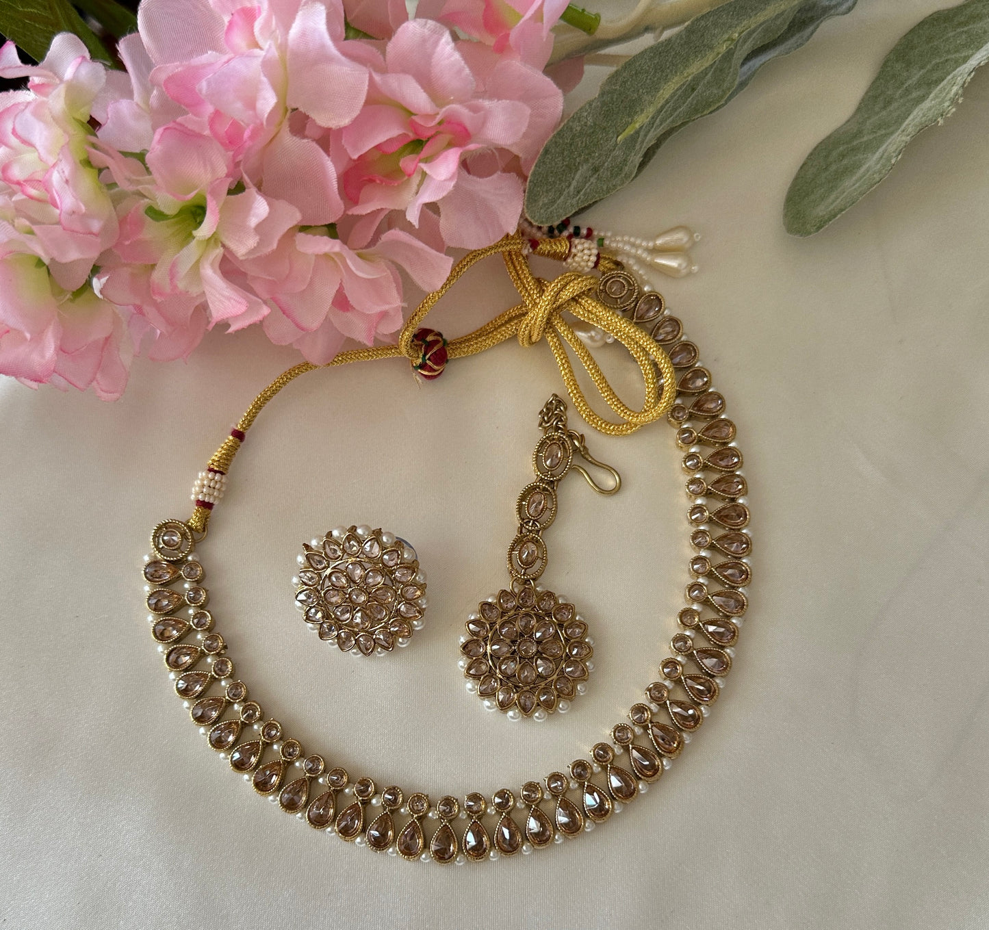 Polki necklace with studs and tikka