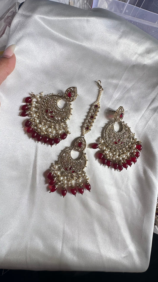 Reverse ad earrings and tikka mehroon ruby