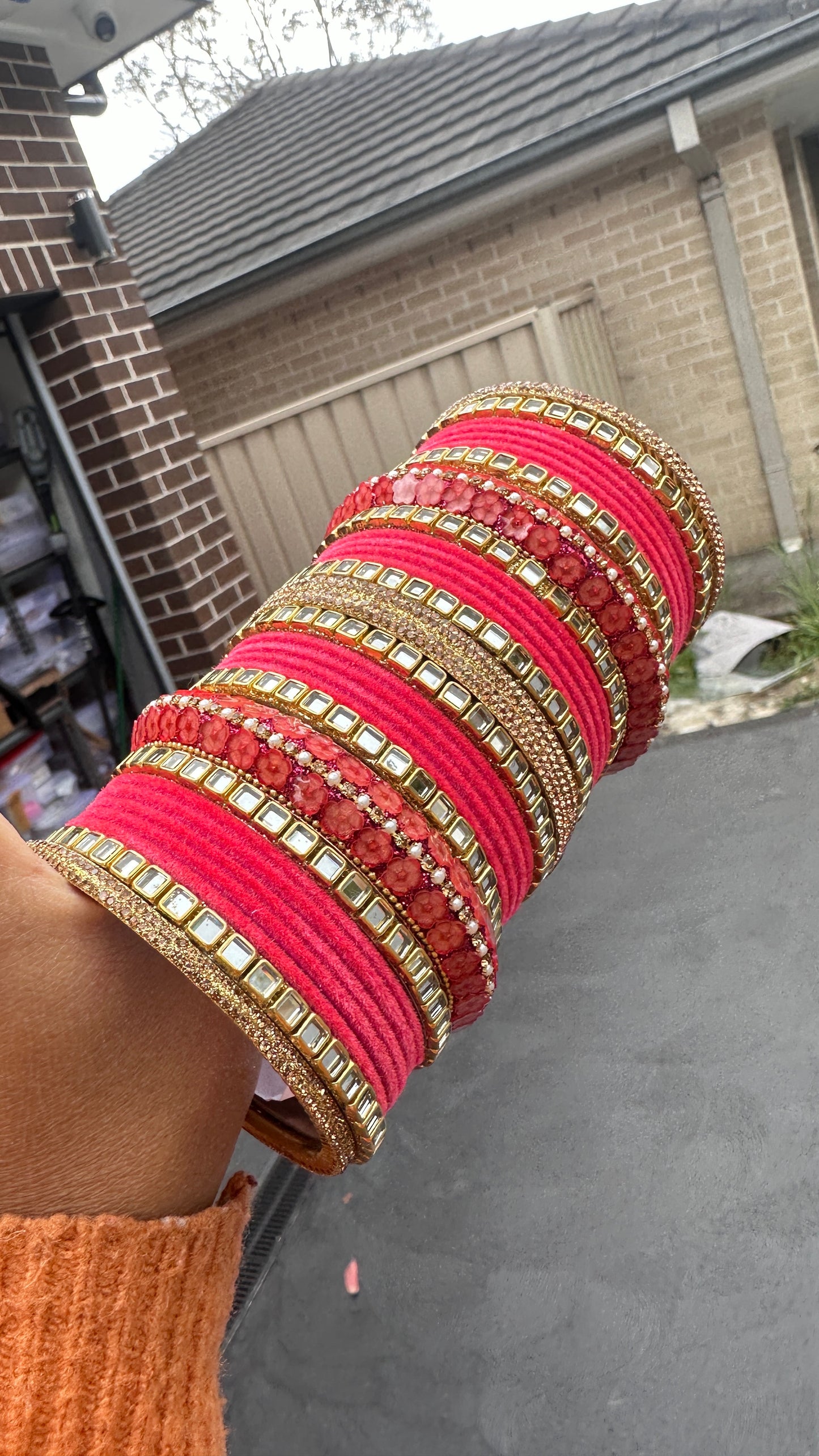 carrot pink metal bangles