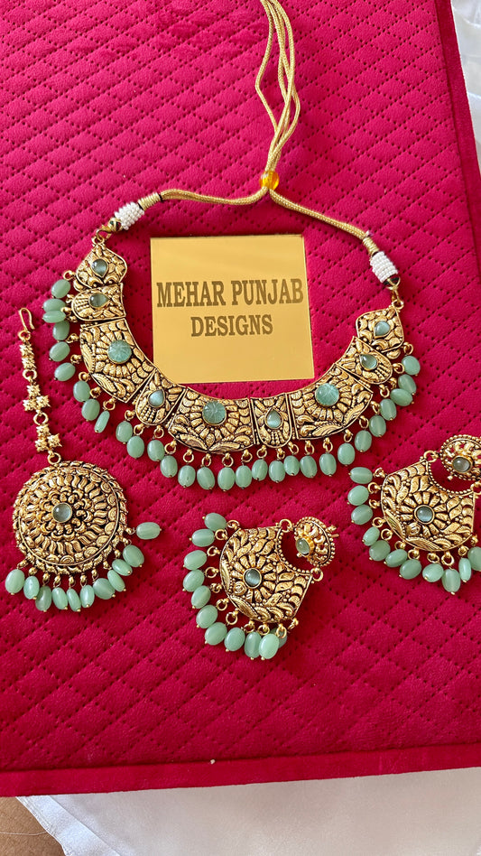 Gold plated necklace  set with earrings and tikka Sandookh