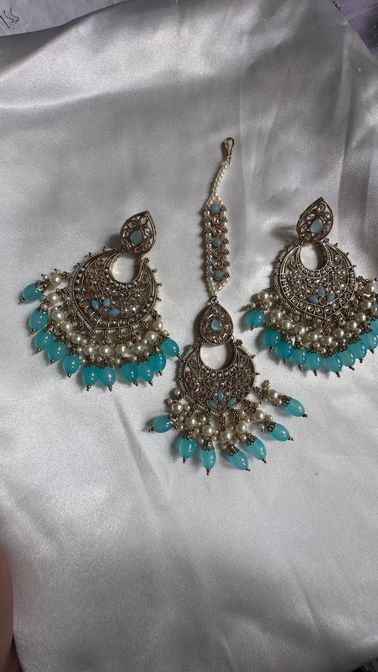 Reverse ad earrings and tikka