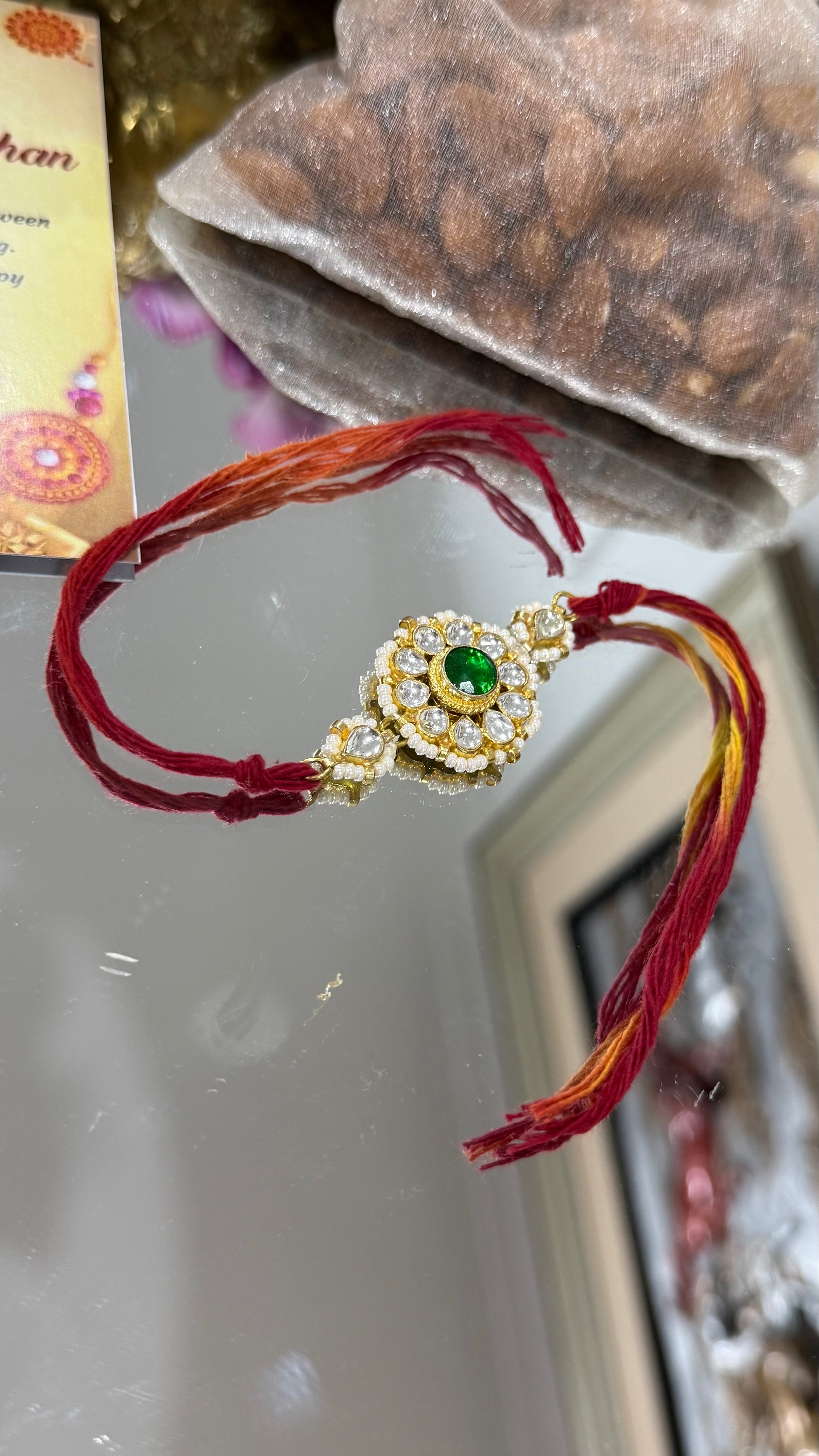 Elegant Pachi Kundan Rakhi with traditional Indian design, available in Australia and worldwide for Raksha Bandhan gifting