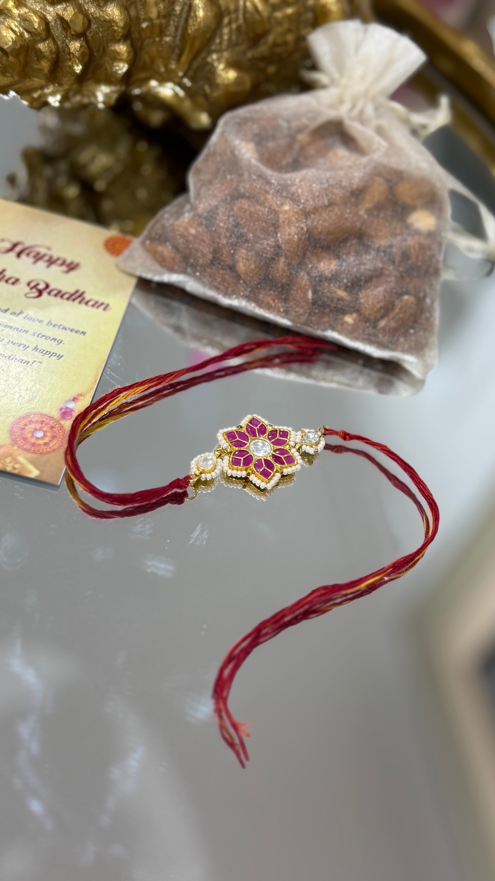 Elegant Pachi Kundan Rakhi with traditional Indian design, available in Australia and worldwide for Raksha Bandhan gifting