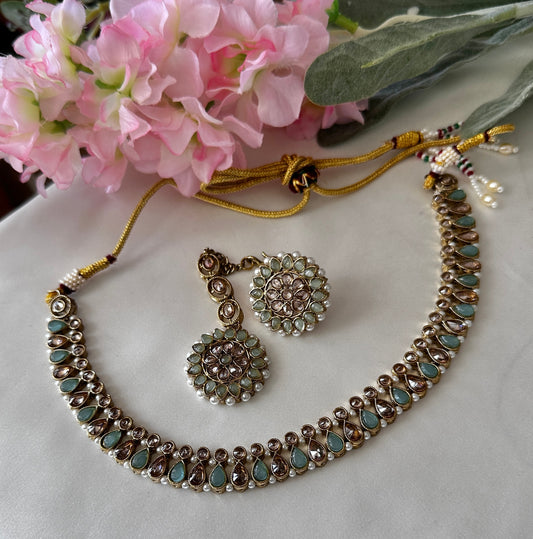 Polki necklace with studs and tikka