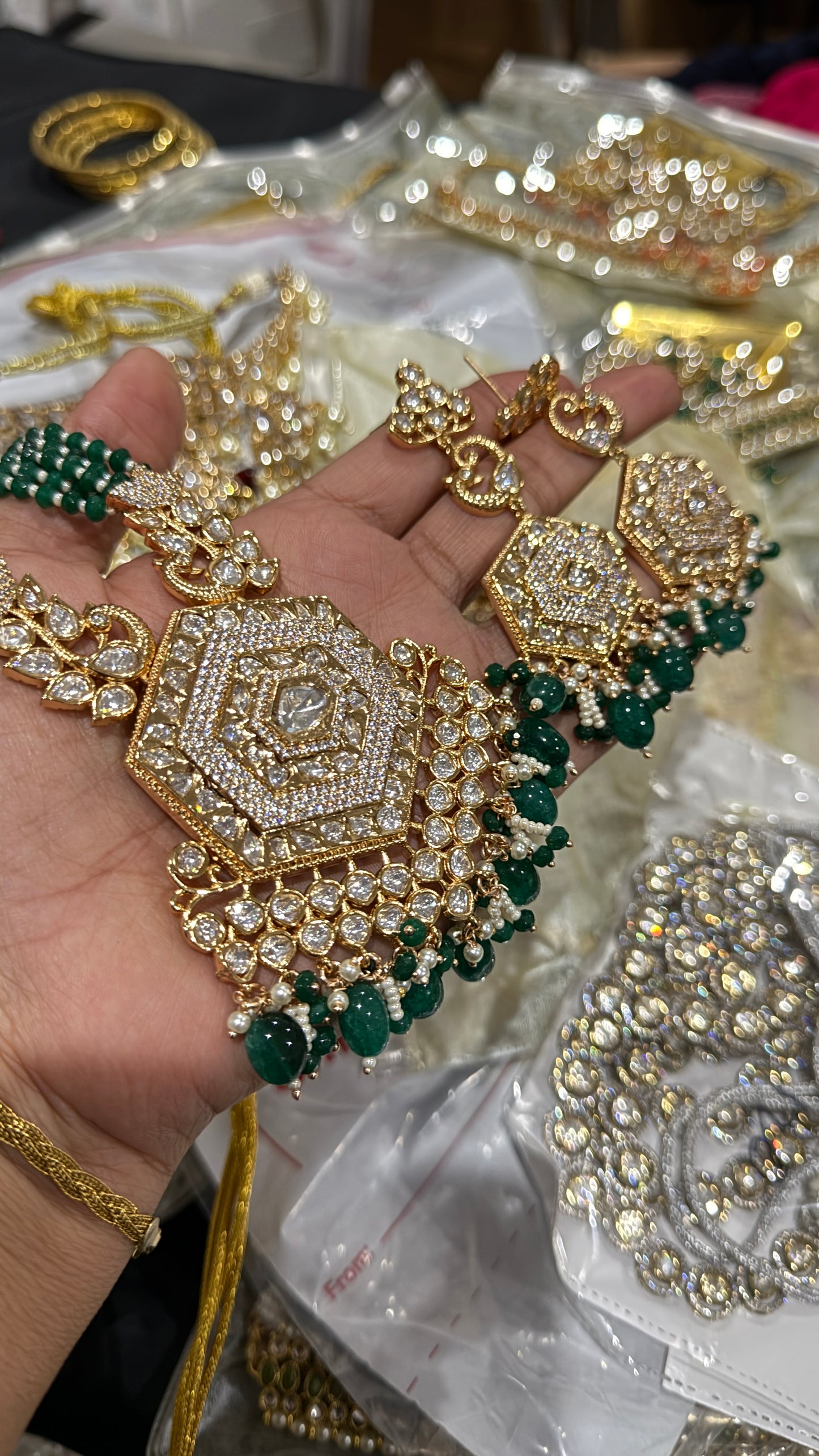 gold plated raani haar uncut kundan color green