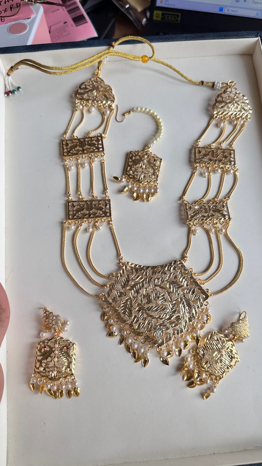 Raani haar with earrings and tikka necklace