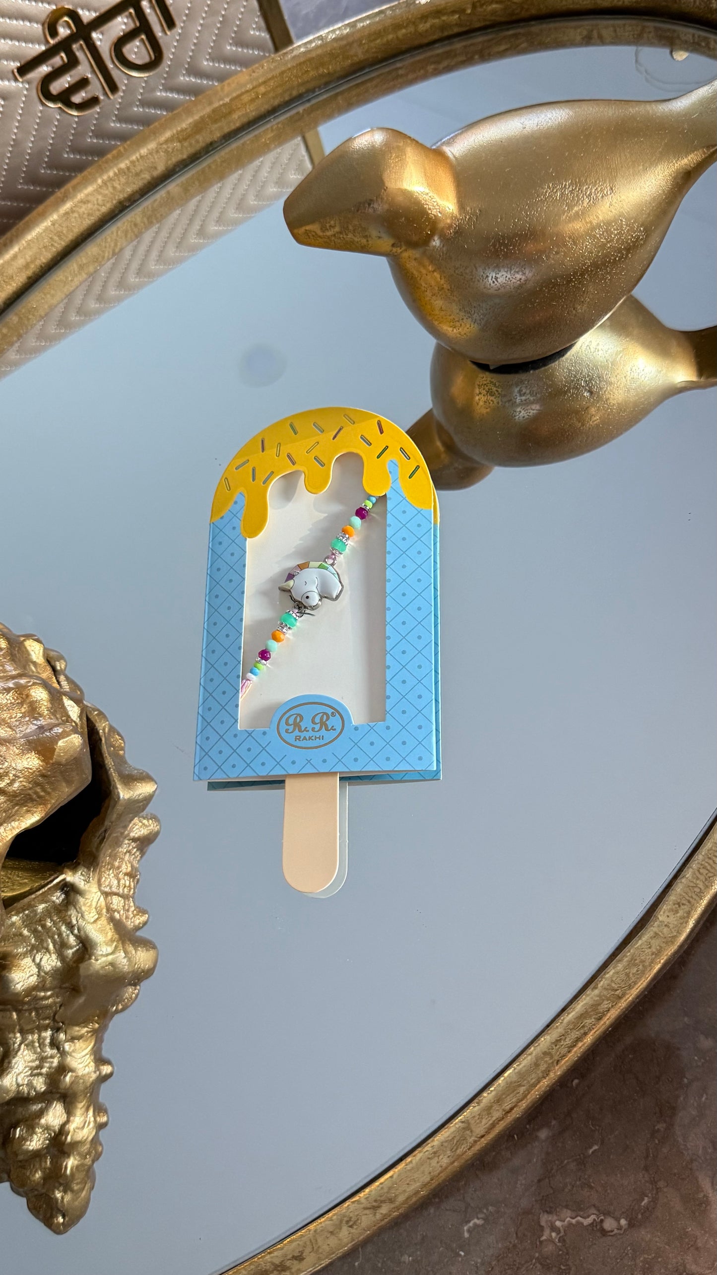 Girls Rakhi with unicorn charm and glitter thread