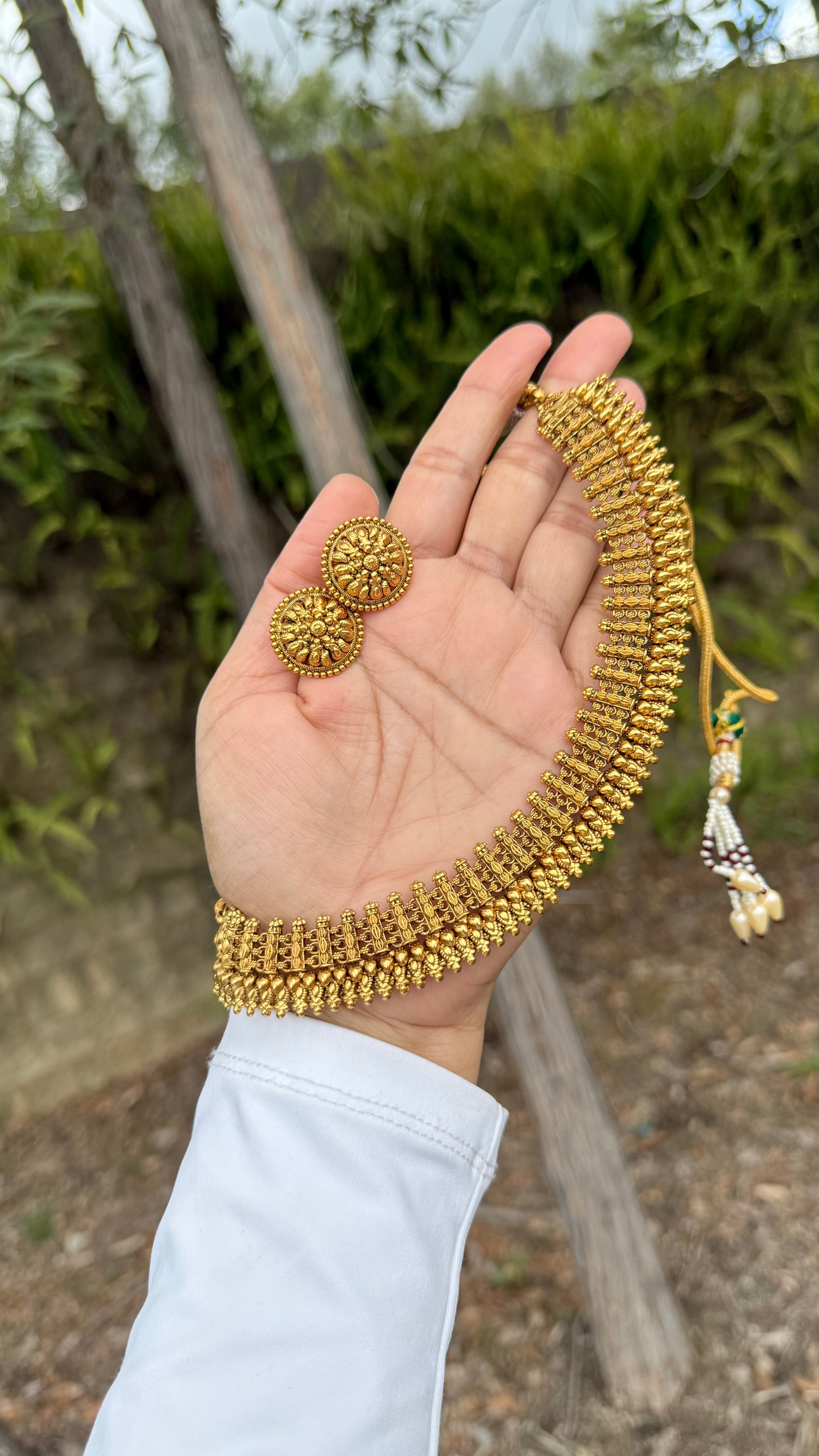 Gold finish Indian necklace for bridal and festive wear