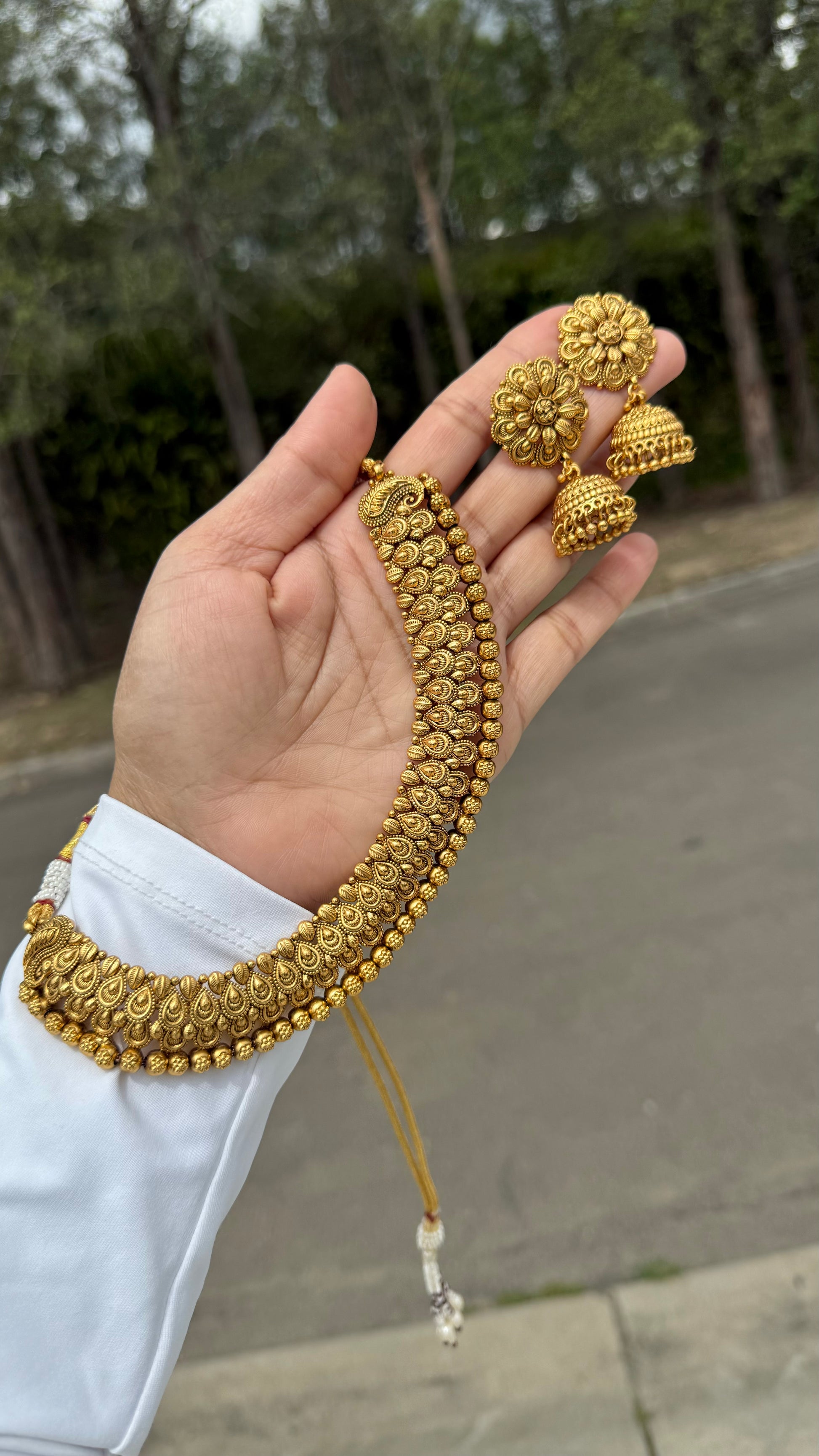 Gold finish Indian necklace for bridal and festive wear Artificial jewelry 