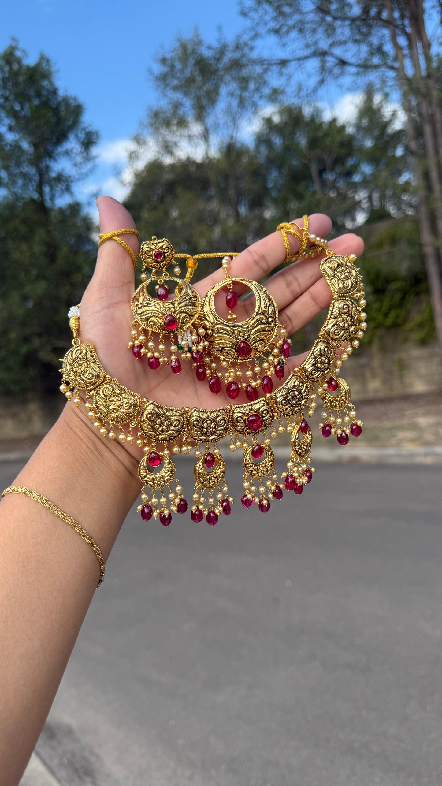 gold plated Indian necklace perfect for bridal wear or party wear