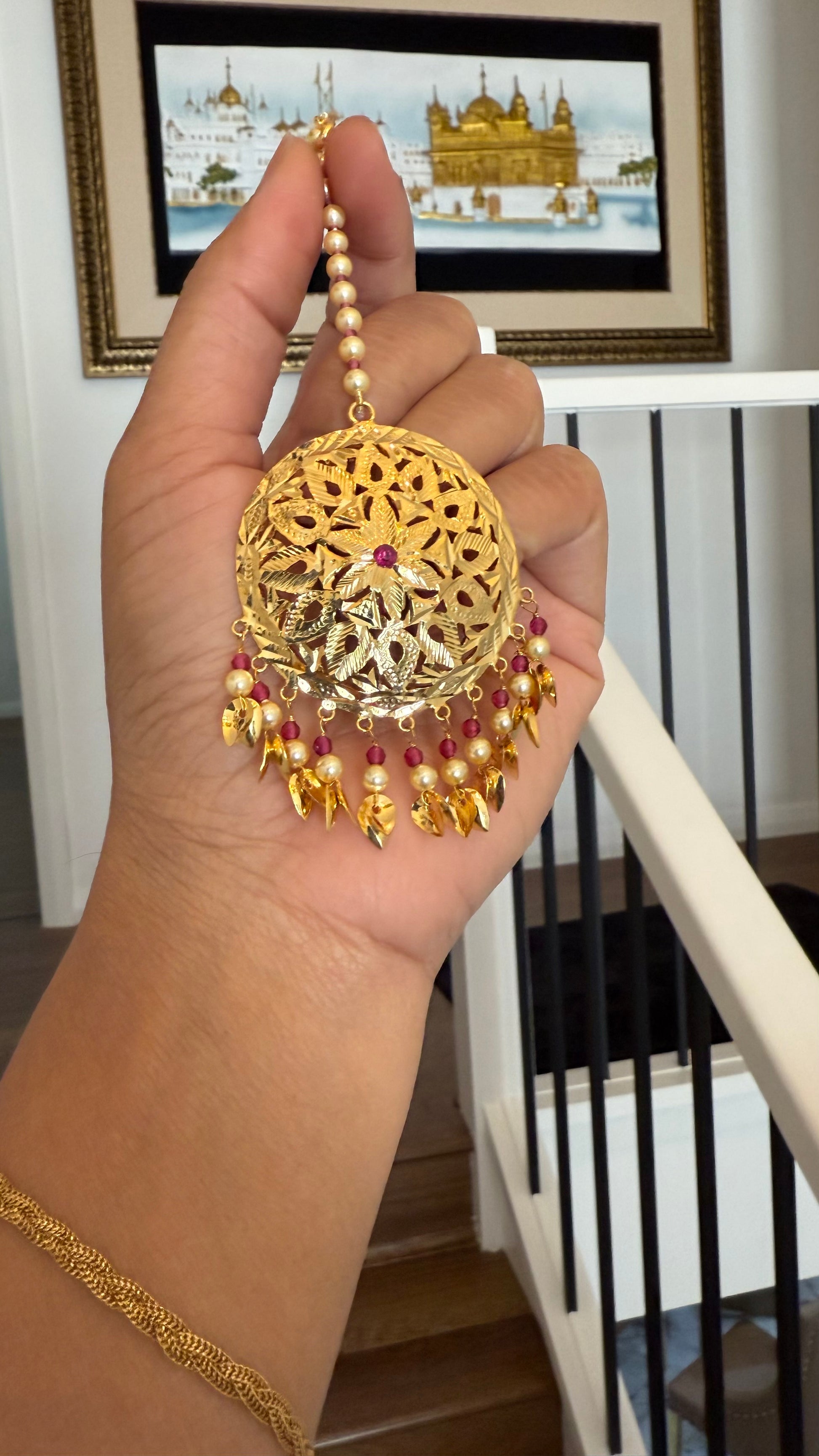 Stunning gold-plated tikka for traditional occasions