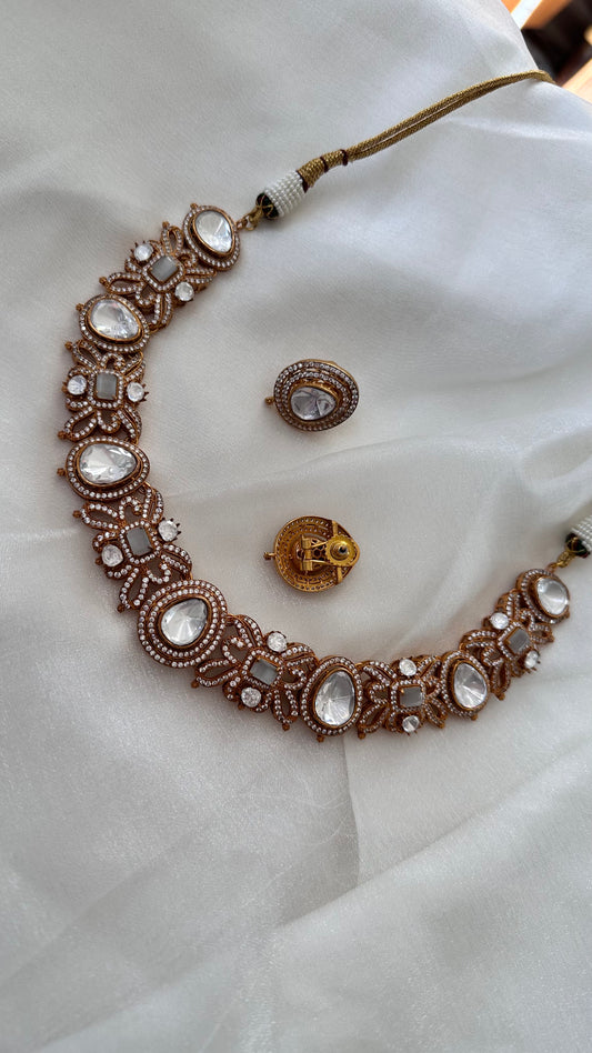 Golden necklace uncut kundan and big polki