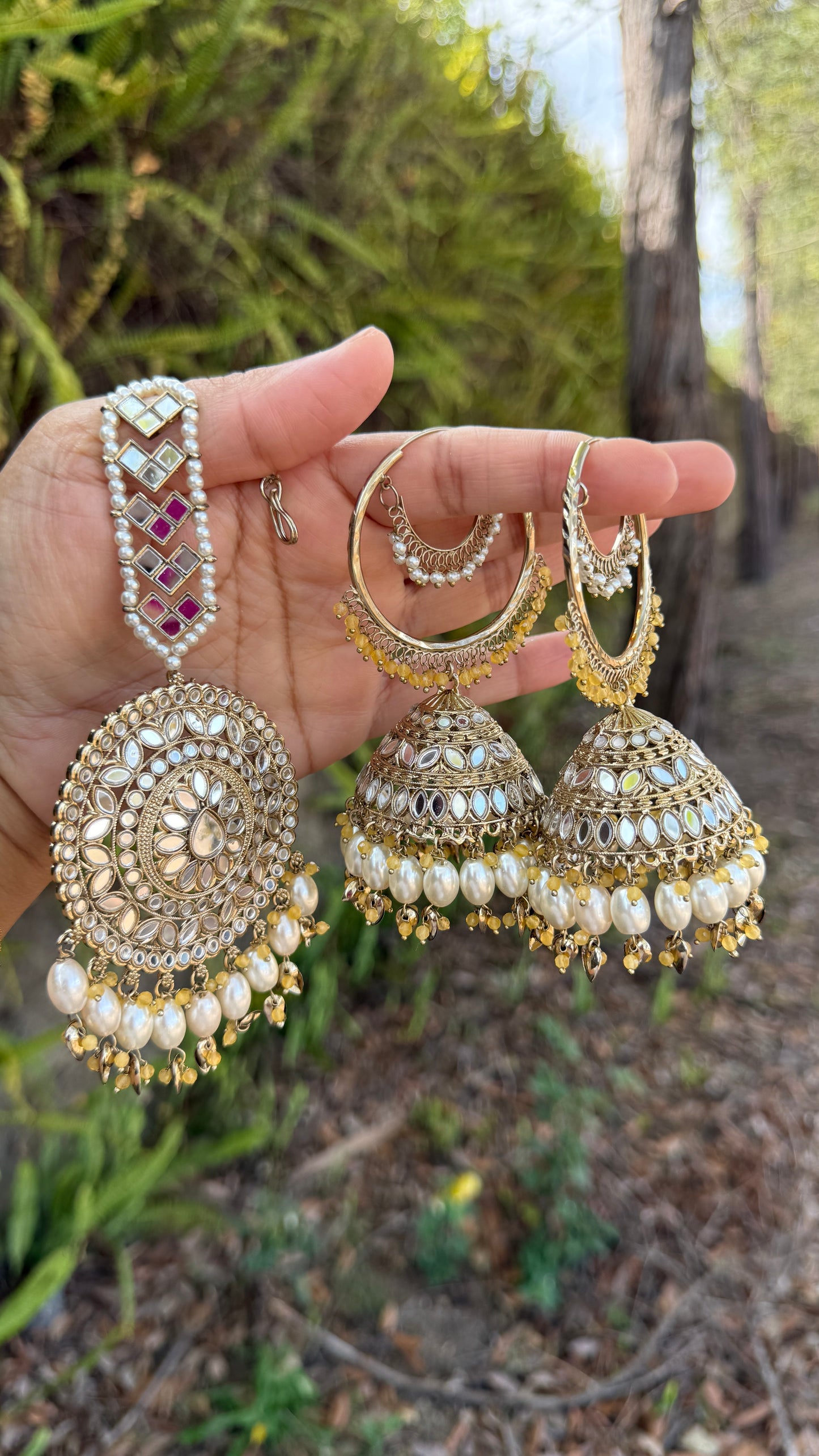 jhumka earrings with matching tikka, adorned with mirrors and intricate detailing, ideal for bridal and cultural events or casual party wear