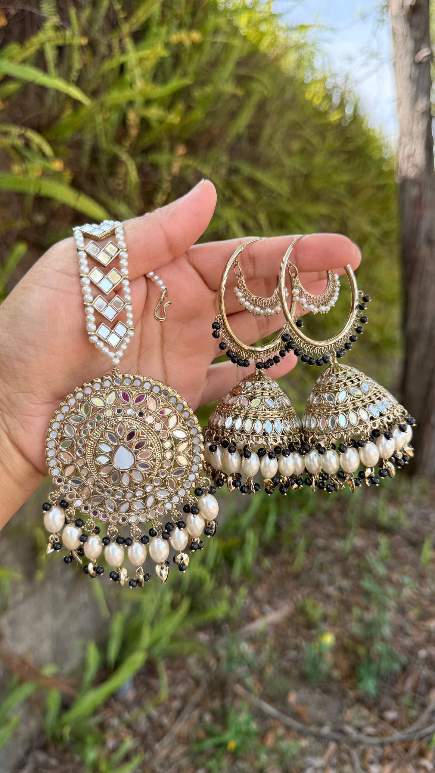 jhumka earrings with matching tikka, adorned with mirrors and intricate detailing, ideal for bridal and cultural events or casual party wear