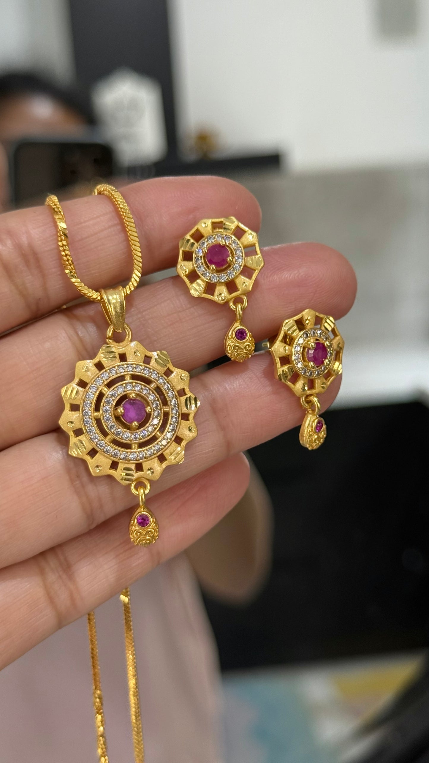 Indian gold-plated pendant chain set with intricate design, traditional jewelry for festive occasions and weddings