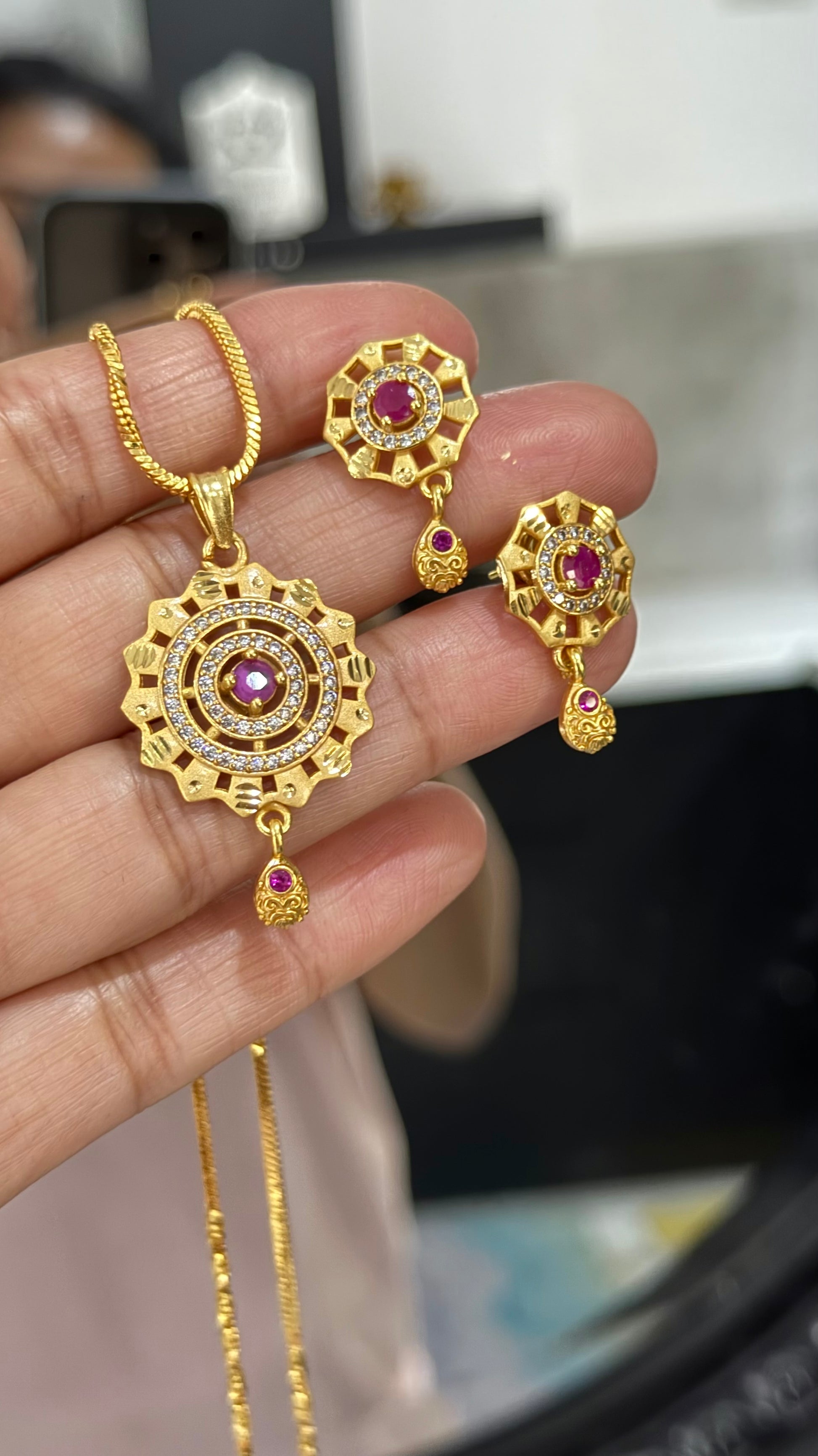 Indian gold-plated pendant chain set with intricate design, traditional jewelry for festive occasions and weddings