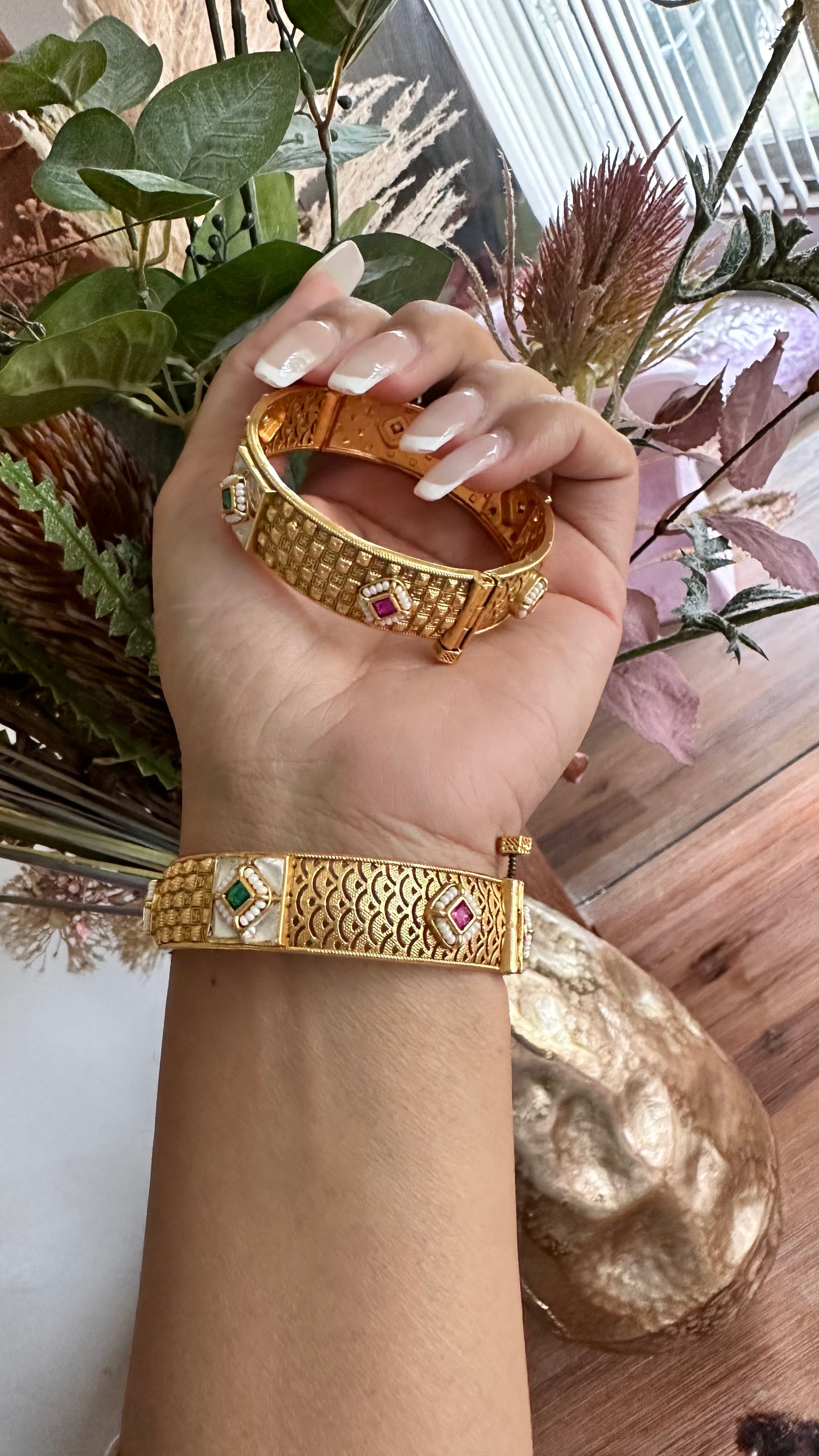 Gold-plated Pachi Kundan kangan bangle with red and green stones, perfect for bridal and festive occasions